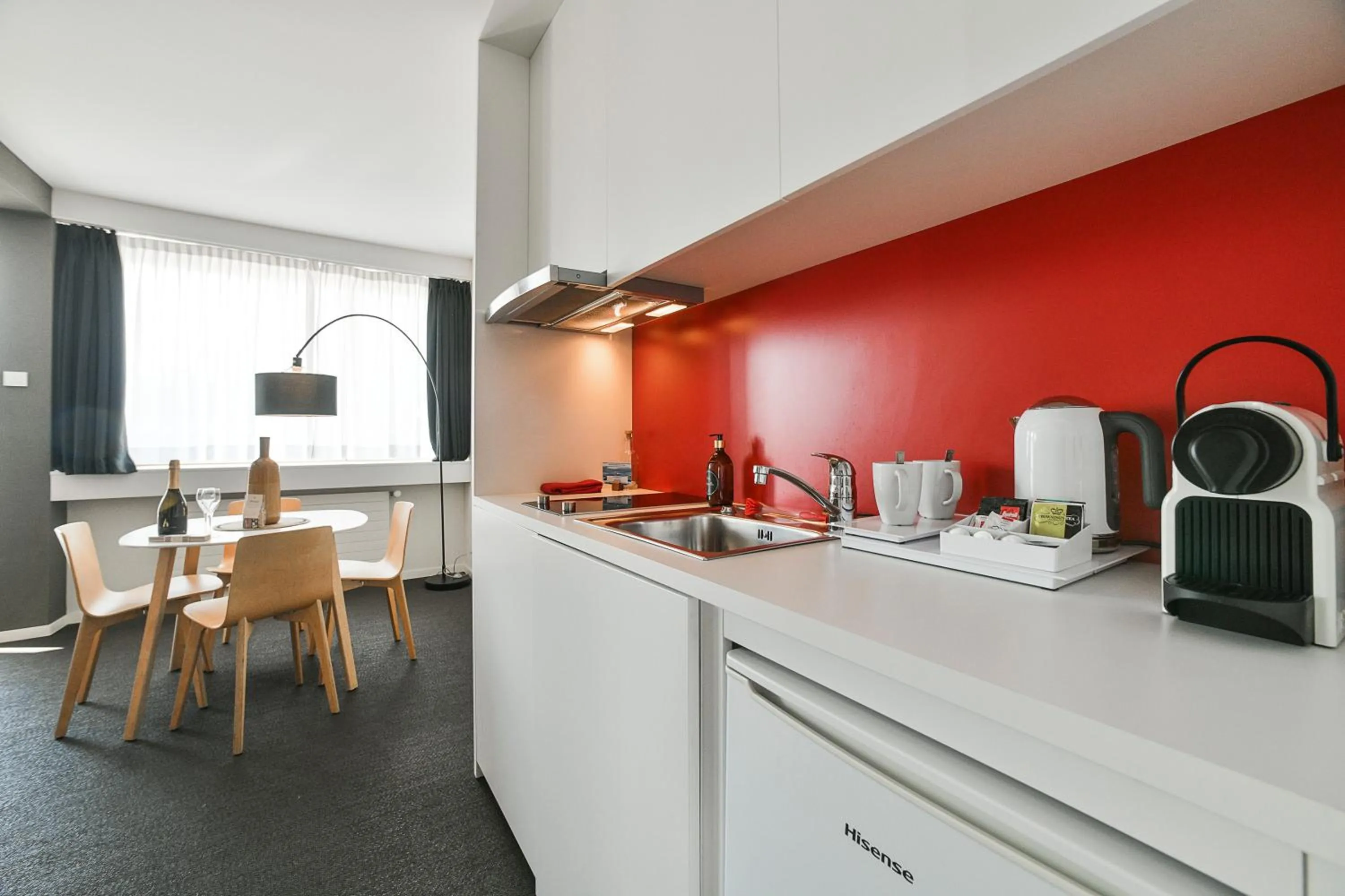 Kitchen or kitchenette in Home Swiss Hotel