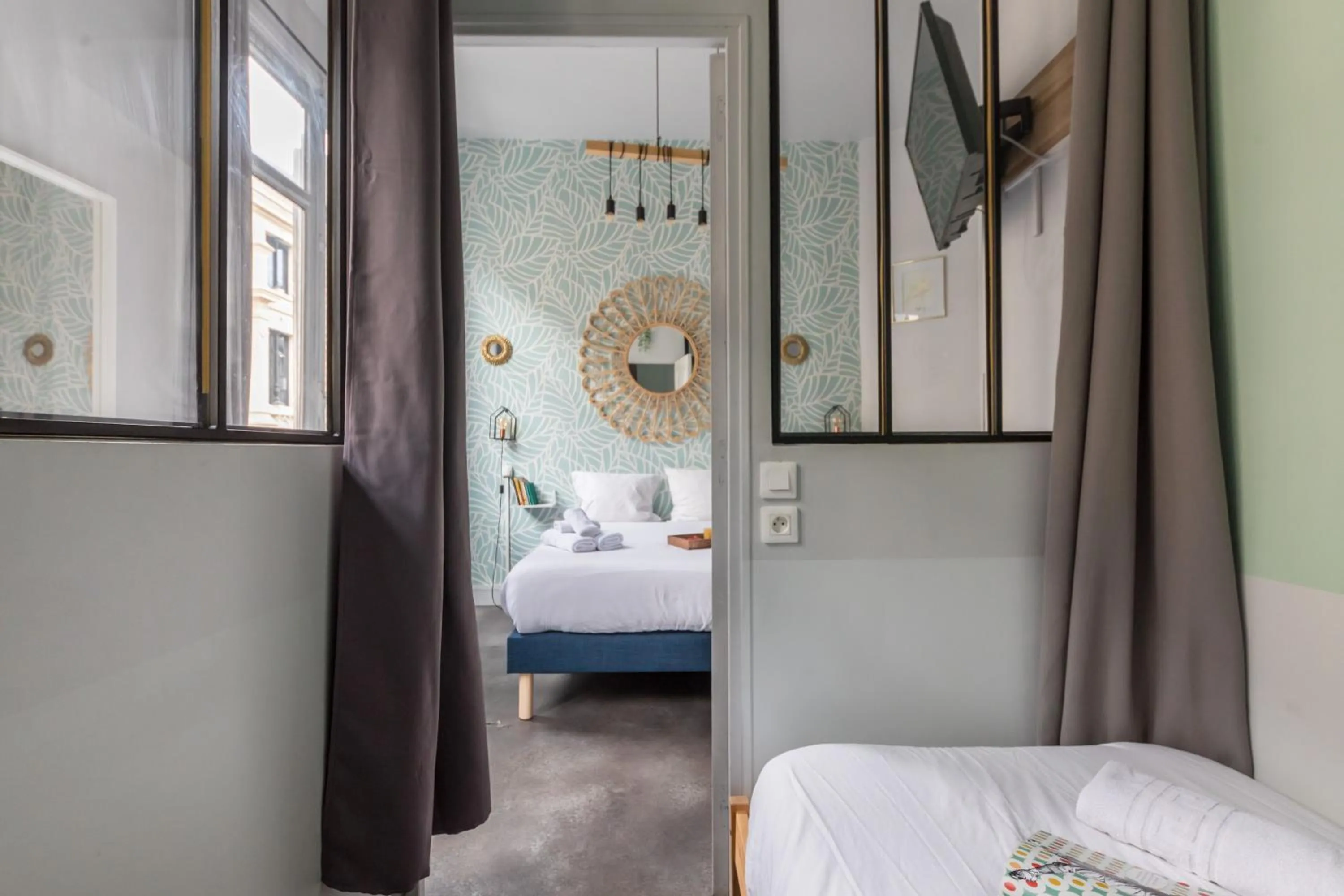 Photo of the whole room, Bed in WS Louvre - Etienne Marcel