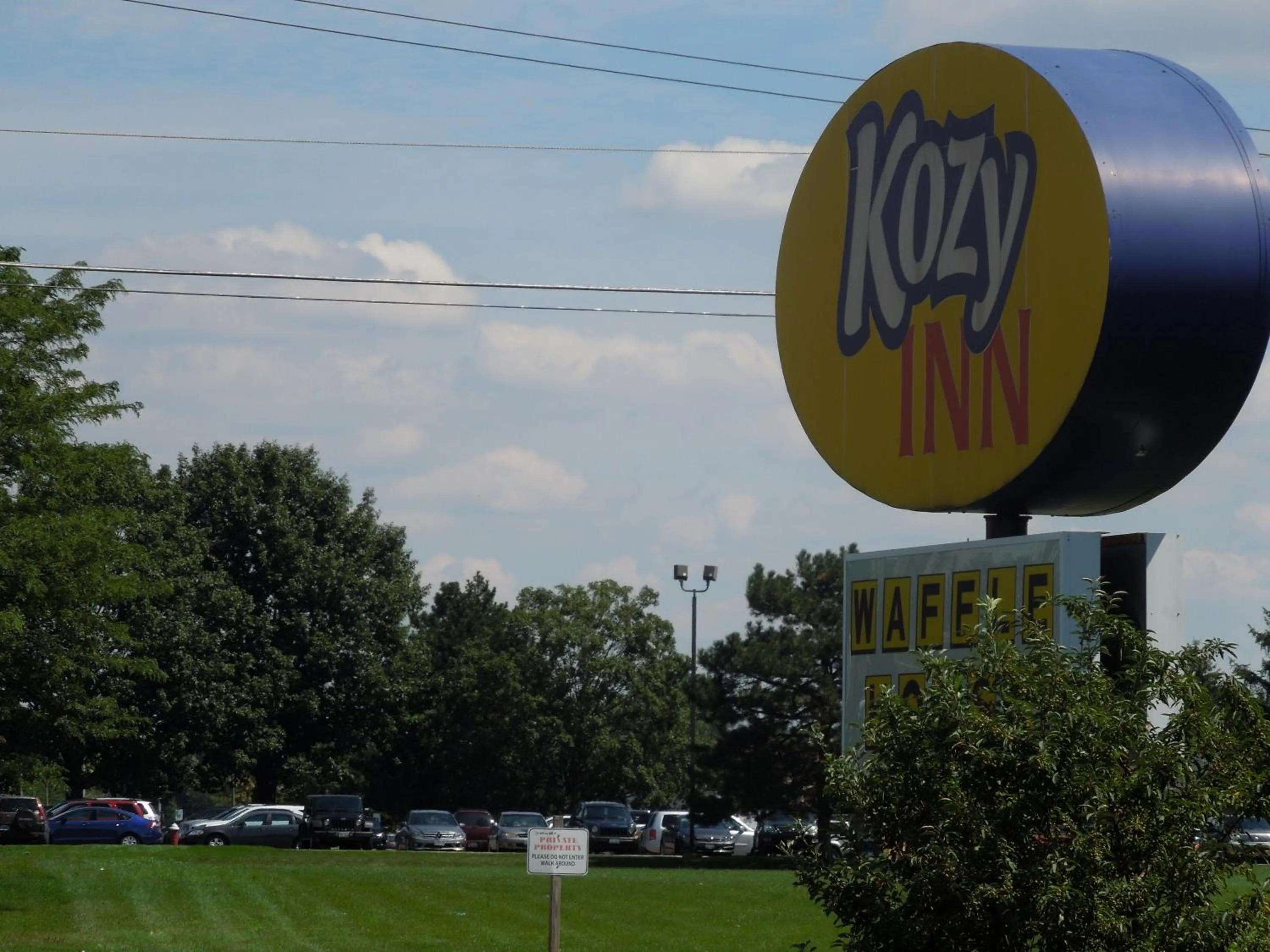 Property logo or sign in Kozy Inn Columbus