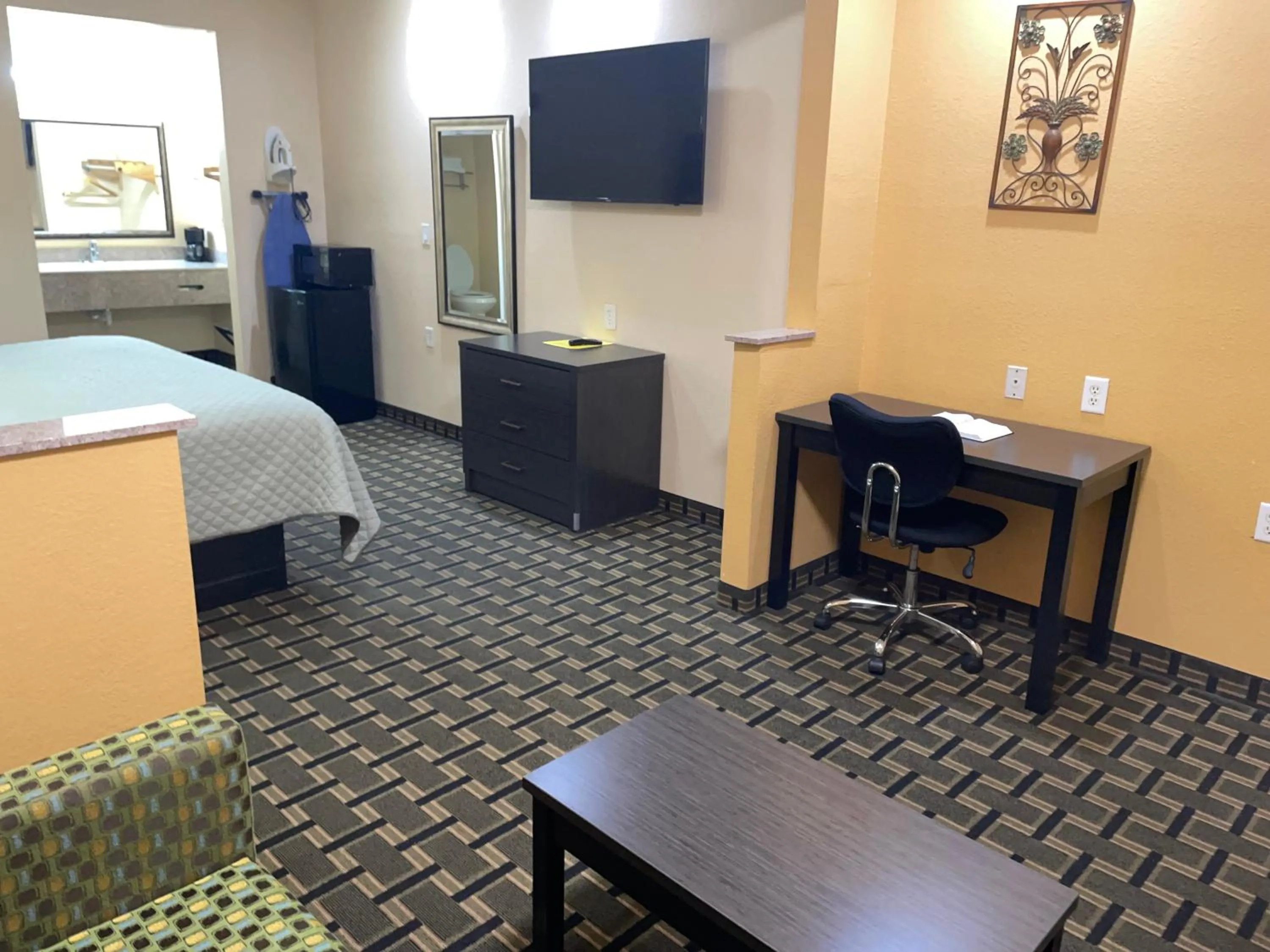 Bed in Homegate Inn & Suites West Memphis