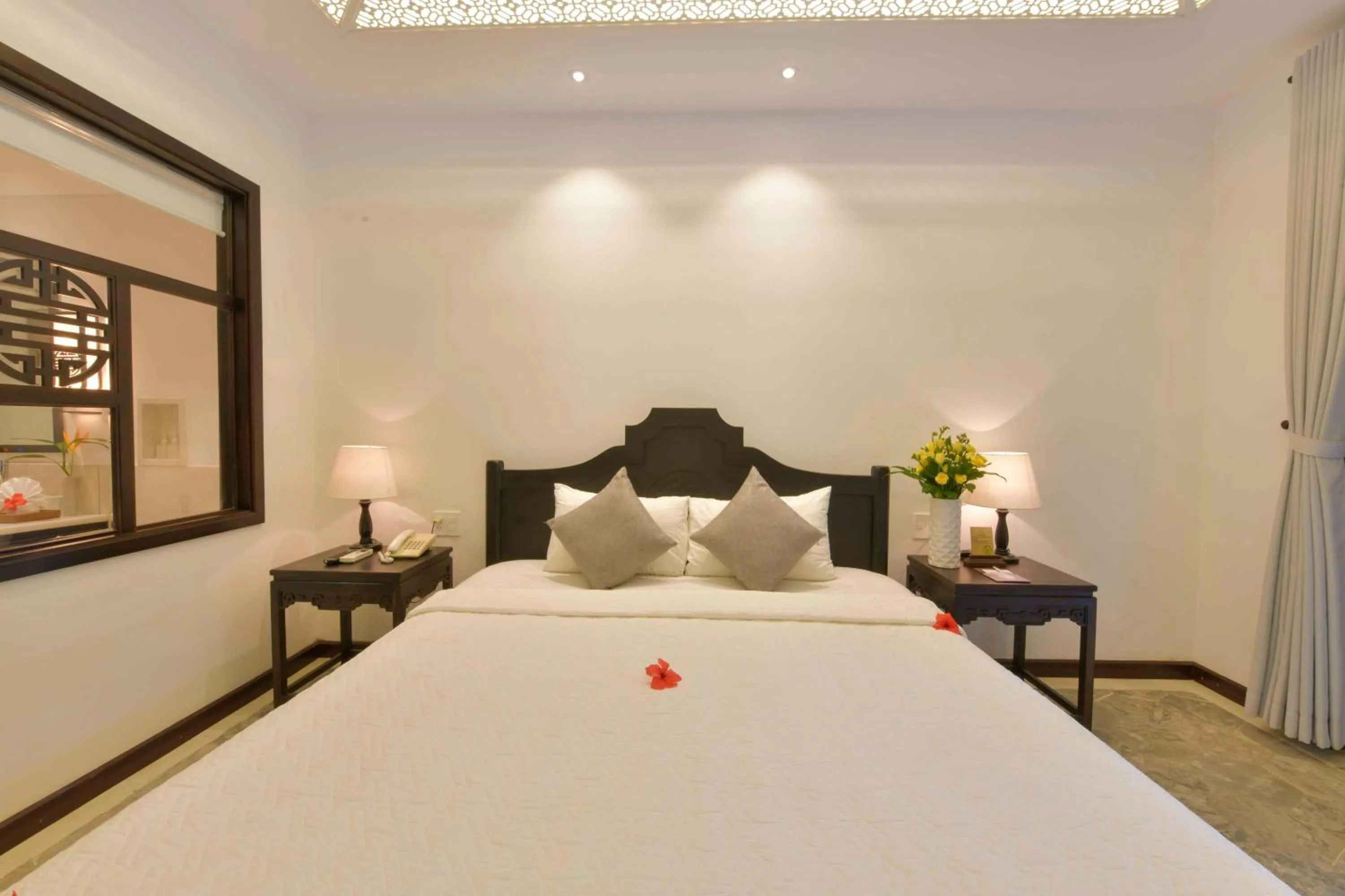 Bed in Hoi An Ancient House Resort & Spa