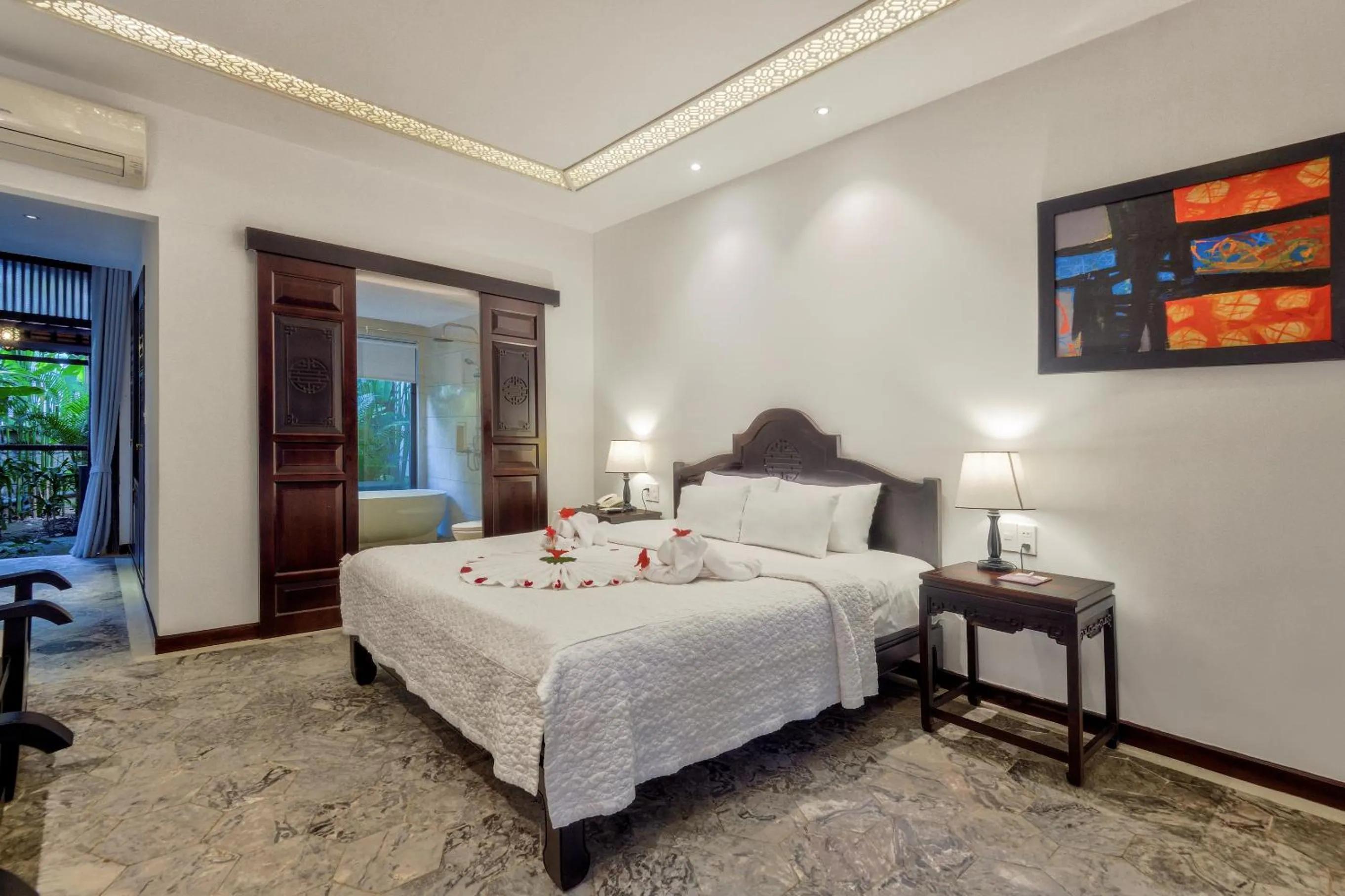 Bed in Hoi An Ancient House Resort & Spa