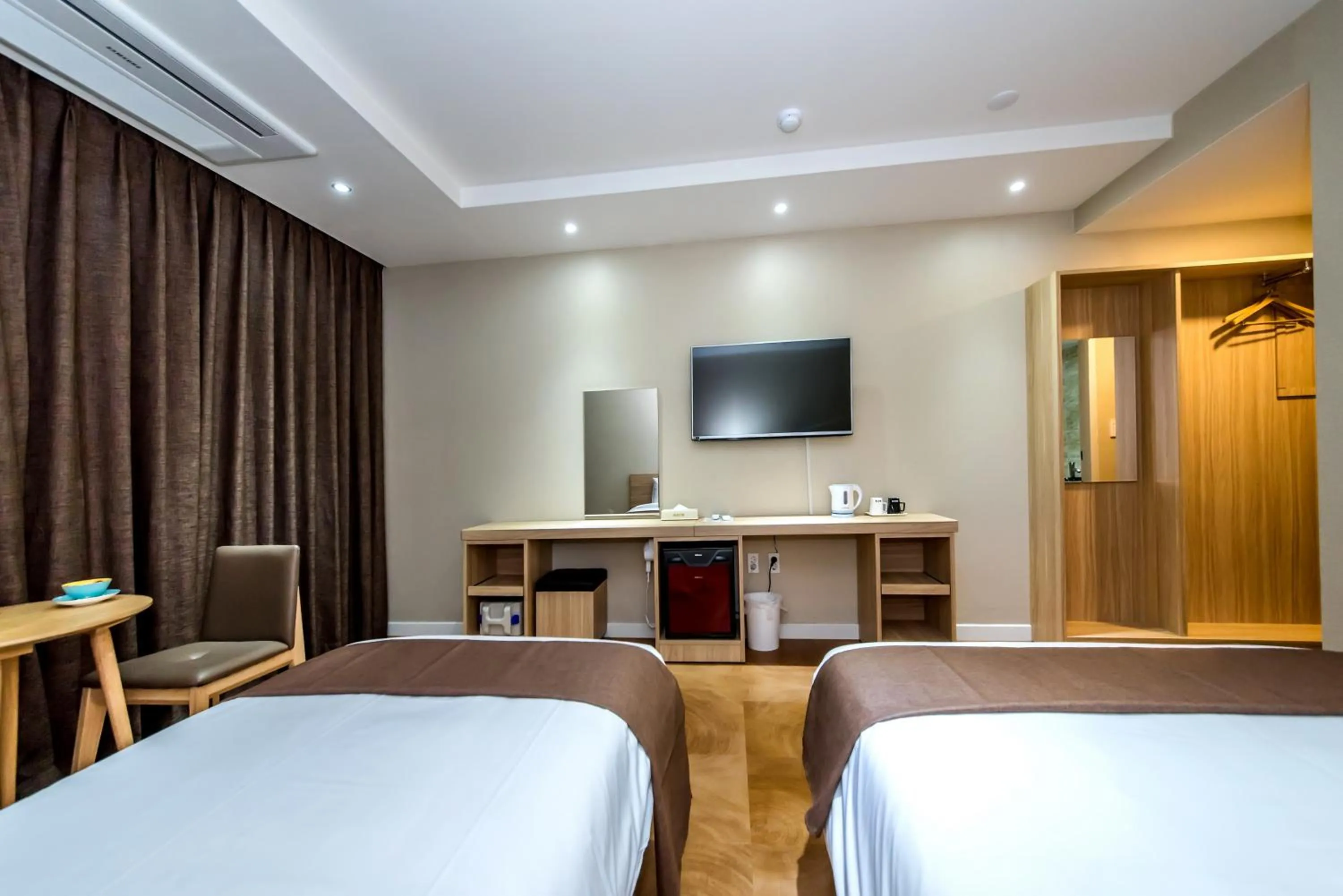 Bed in Jeju In Hotel