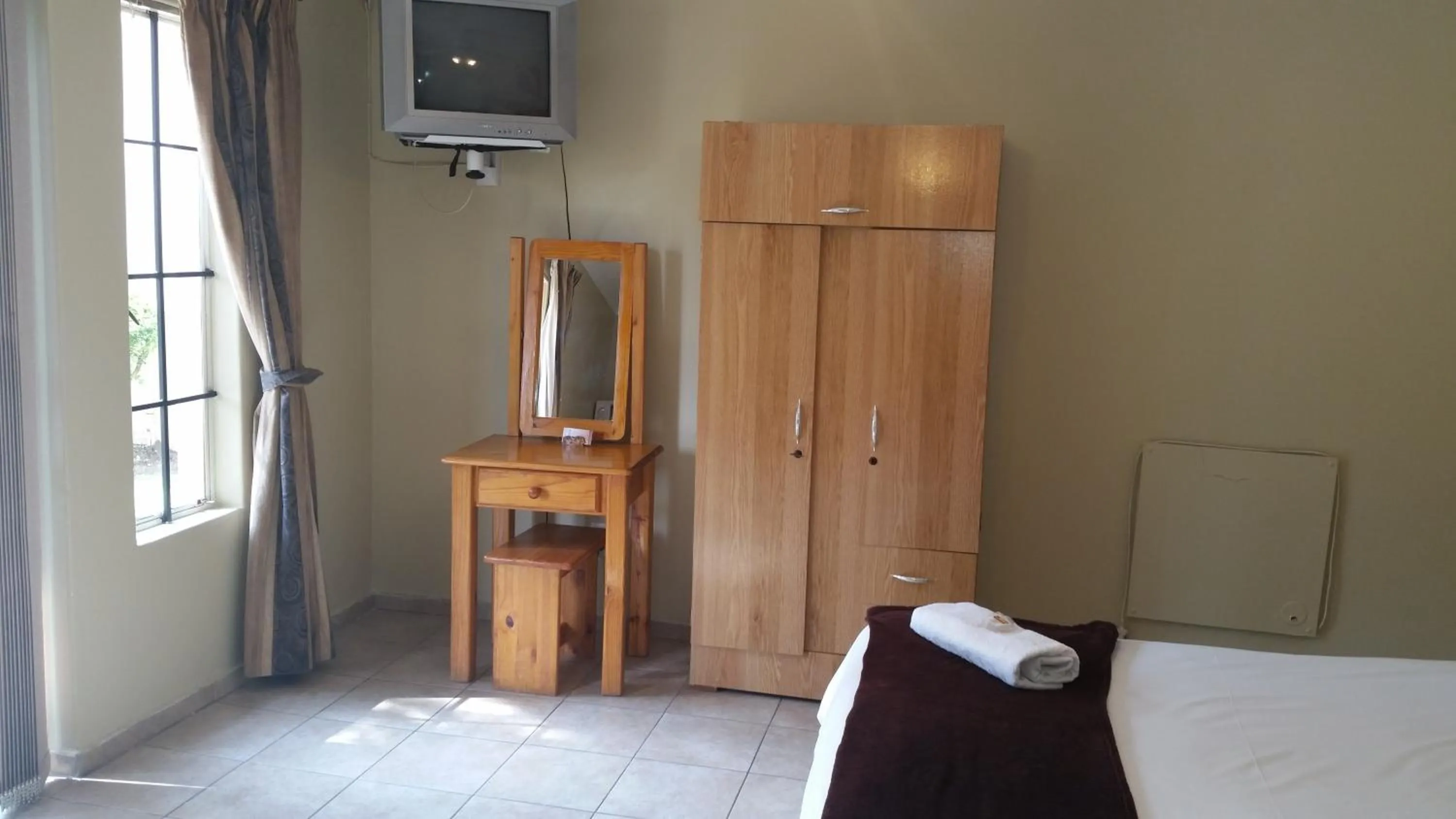 Photo of the whole room, Bed in Louhallas Accommodation