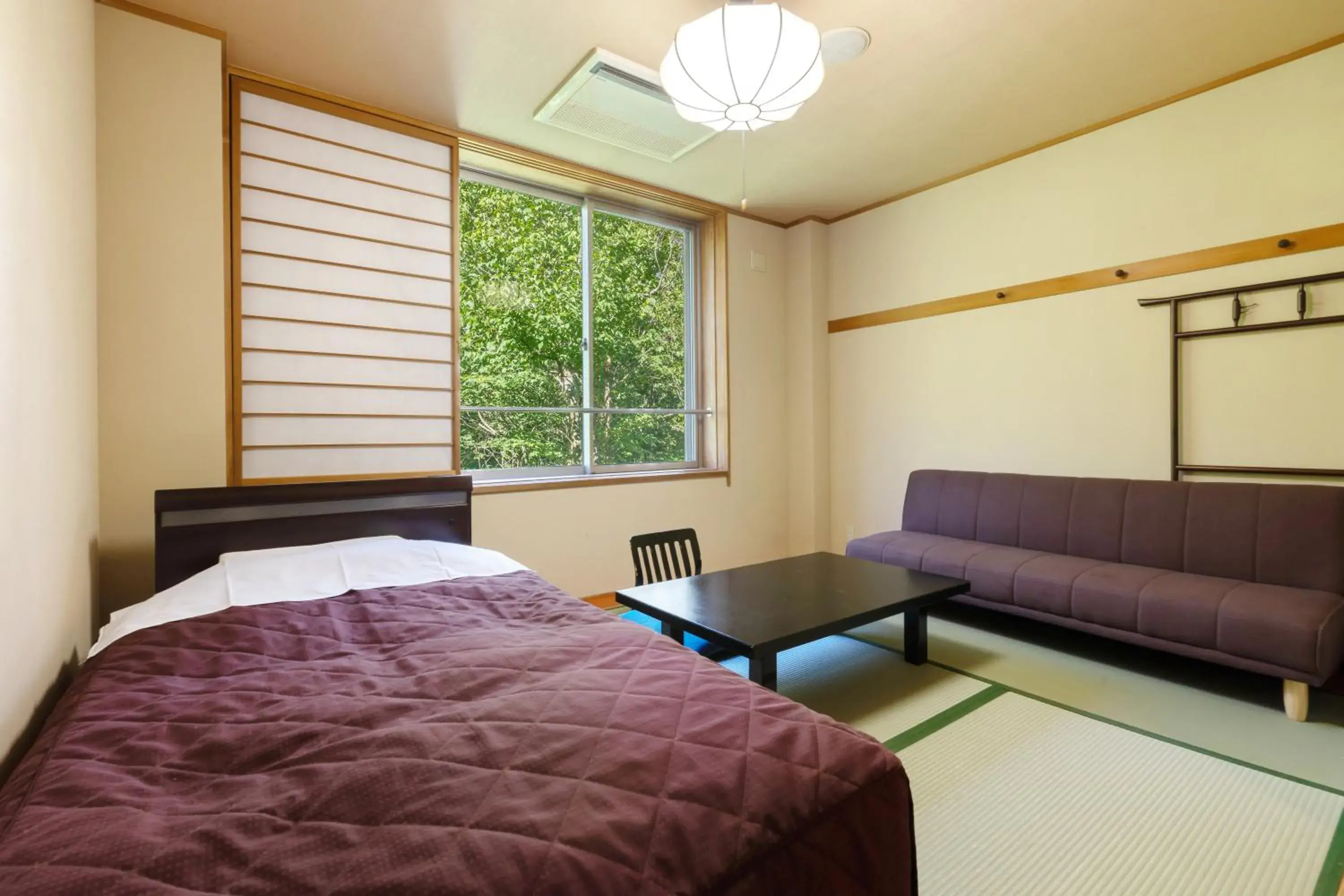 Photo of the whole room, Bed in Plaza Hotel Sanrokuso Photo of the whole room, Bed in Plaza Hotel Sanrokuso