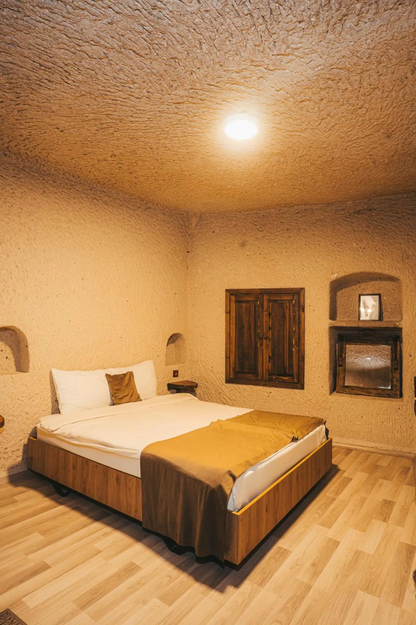Bed in Mia Cappadocia Cave Hotel