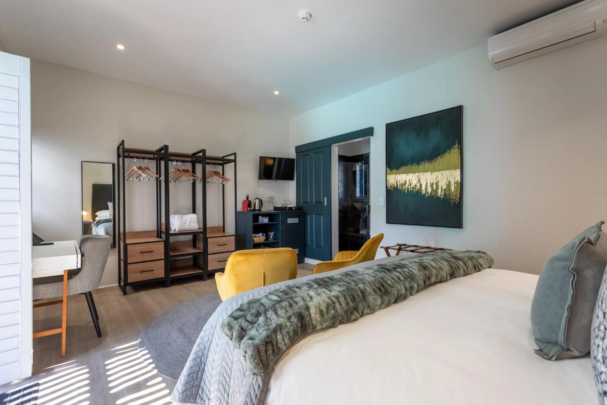 Bed in Abalone Hotel & Villas