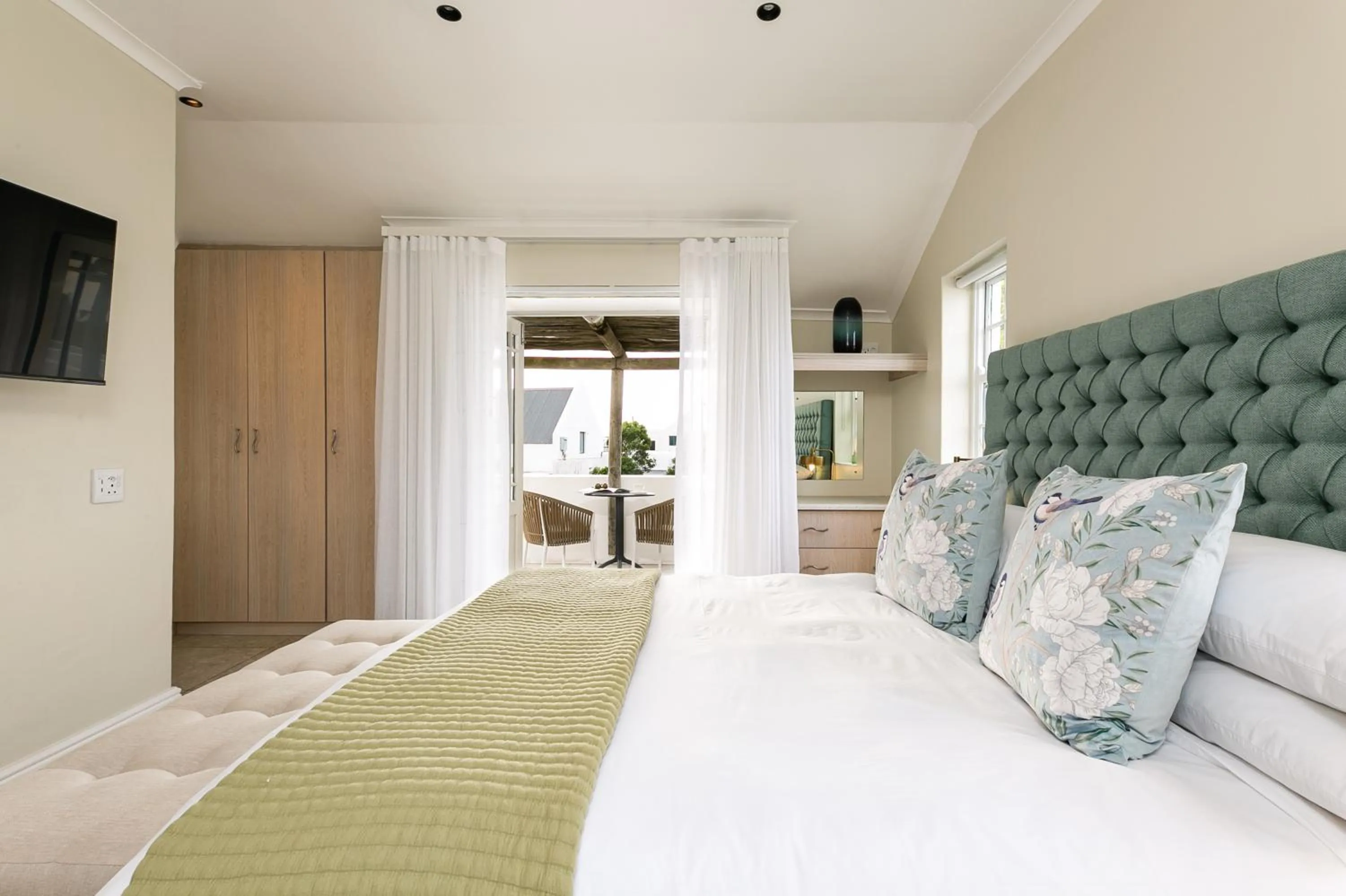 Bed in Abalone Hotel & Villas