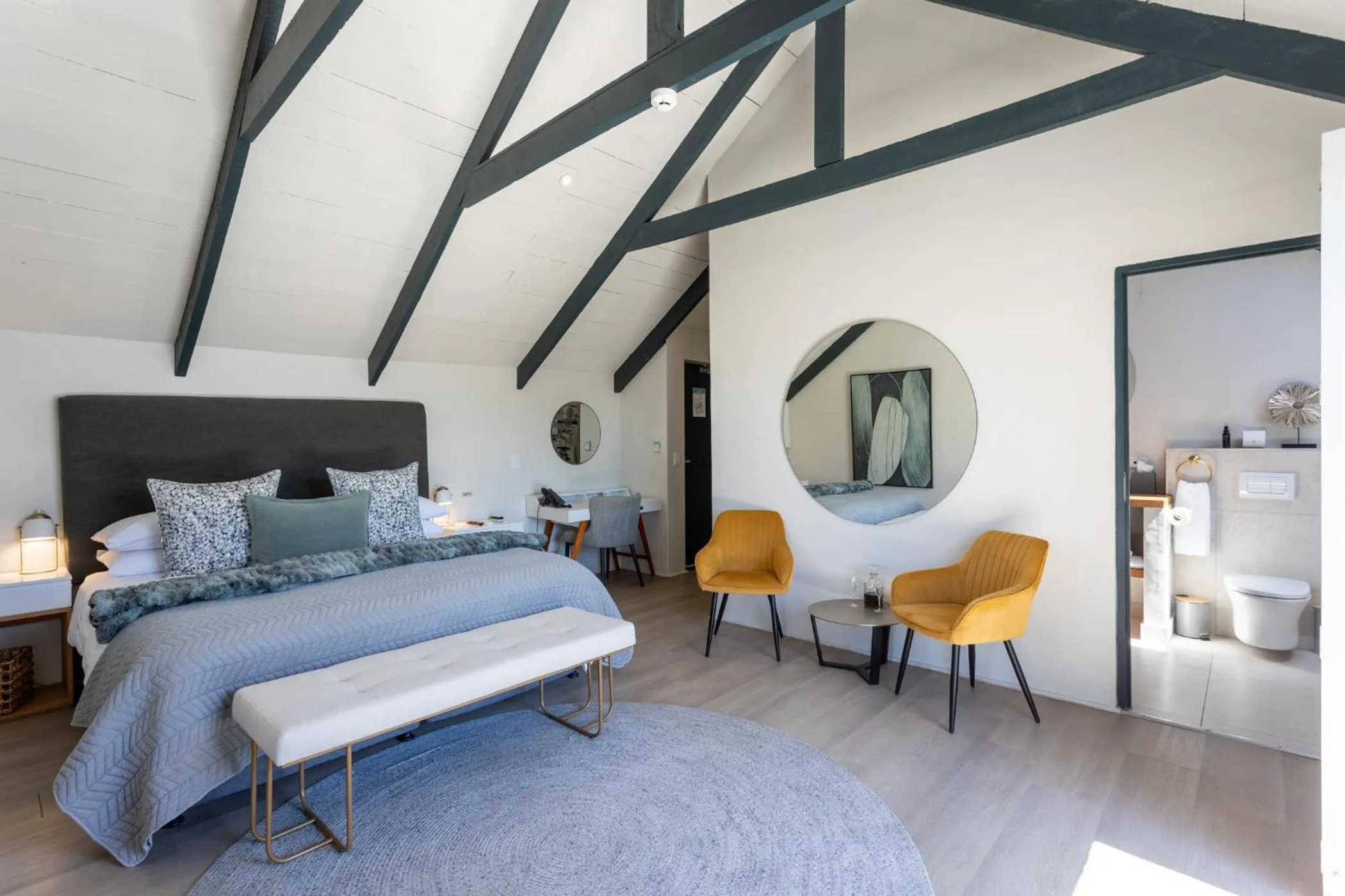 Bed in Abalone Hotel & Villas