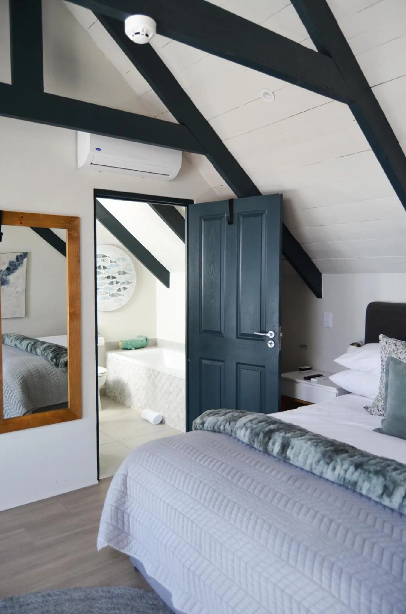 Bed in Abalone Hotel & Villas