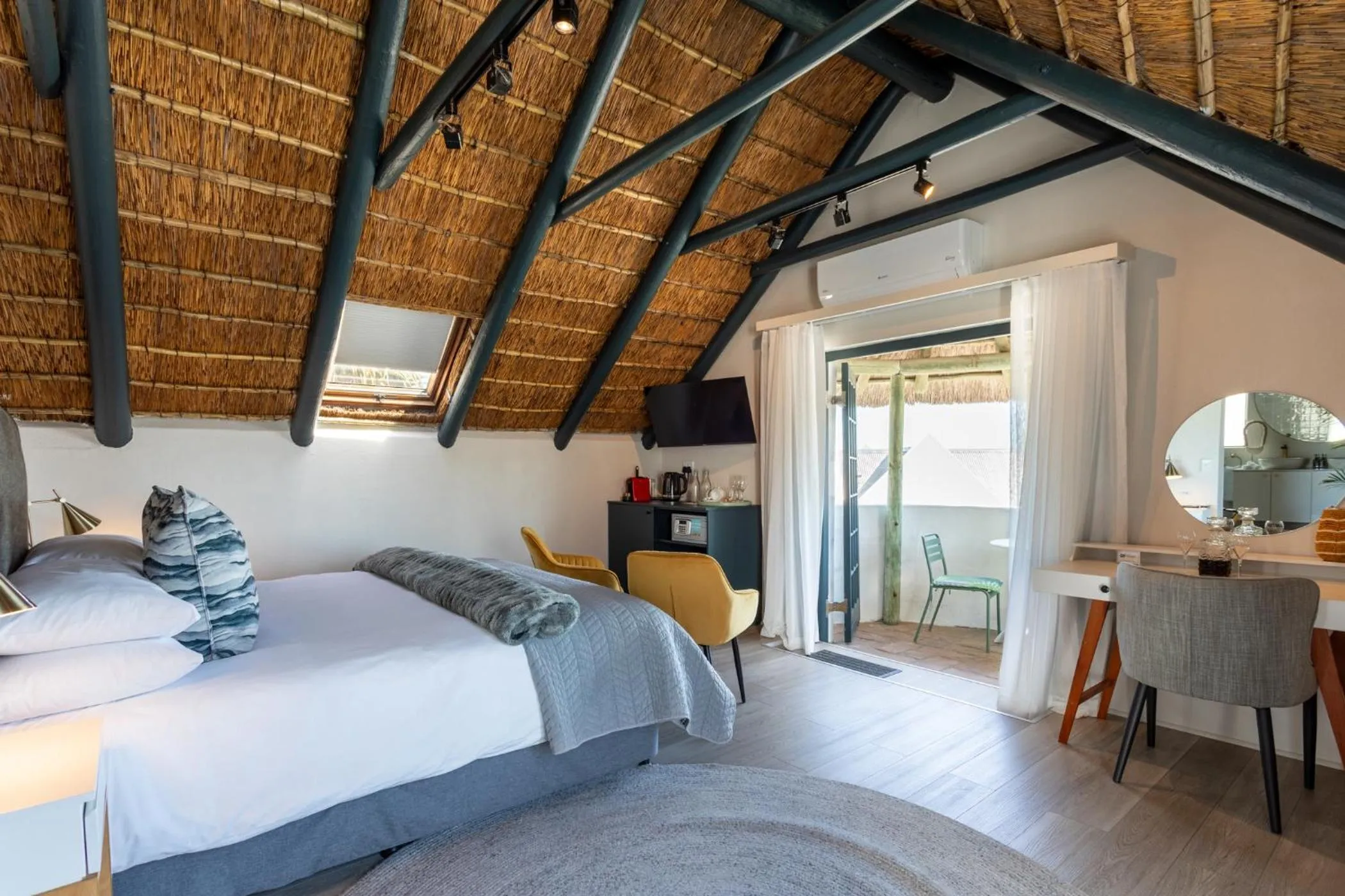 Bed in Abalone Hotel & Villas