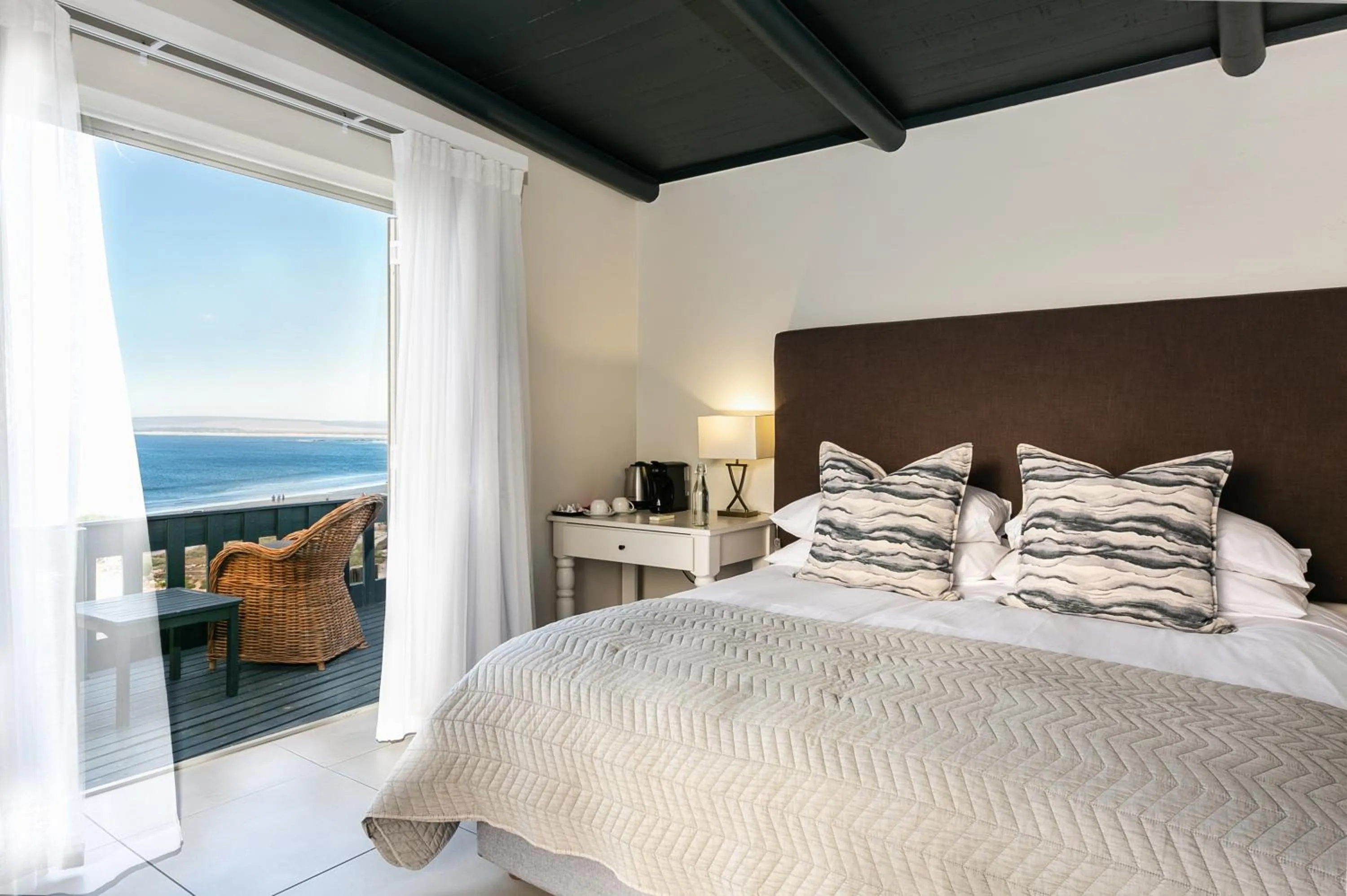 View (from property/room), Bed in Abalone Hotel & Villas