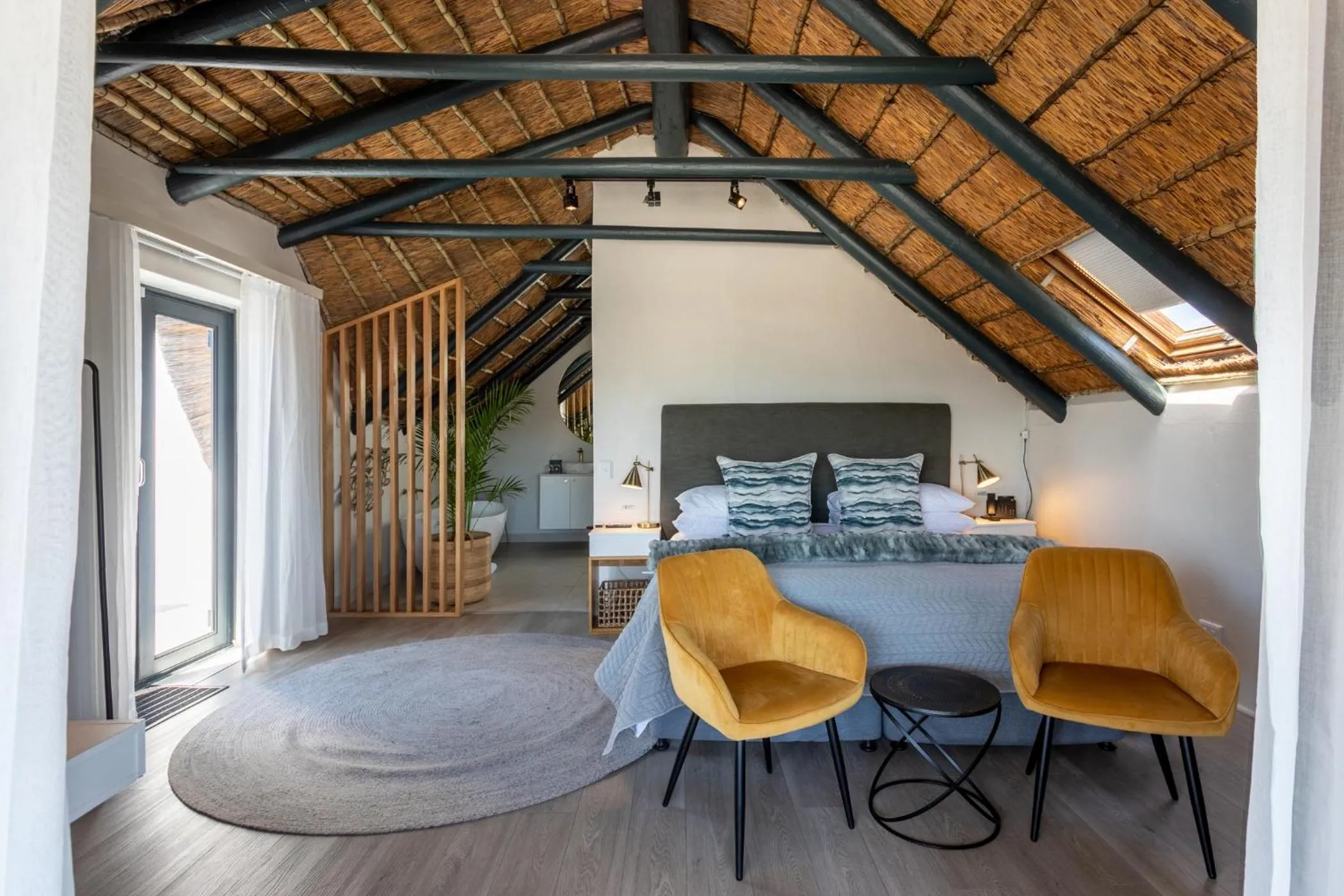 Bed in Abalone Hotel & Villas