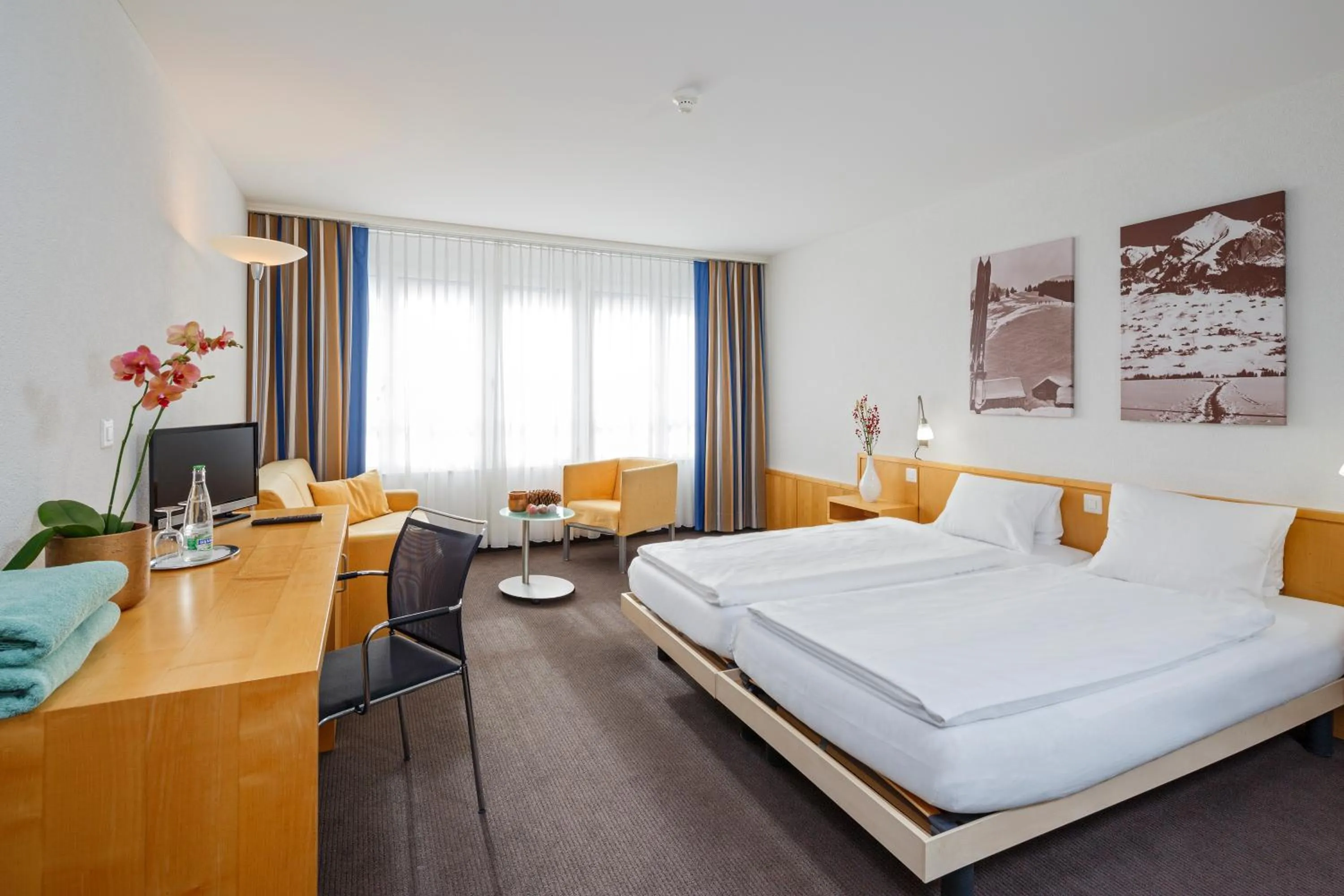 Photo of the whole room, Bed in Hotel Hirschen Wildhaus