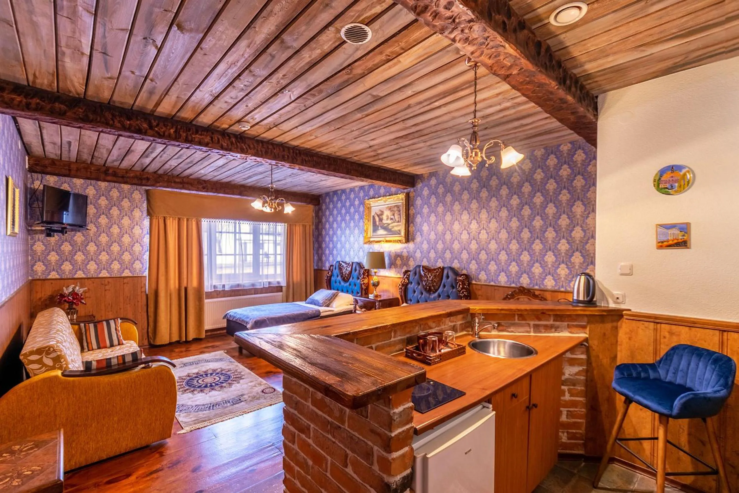 Kitchen or kitchenette, Bed in Hansa Hotel