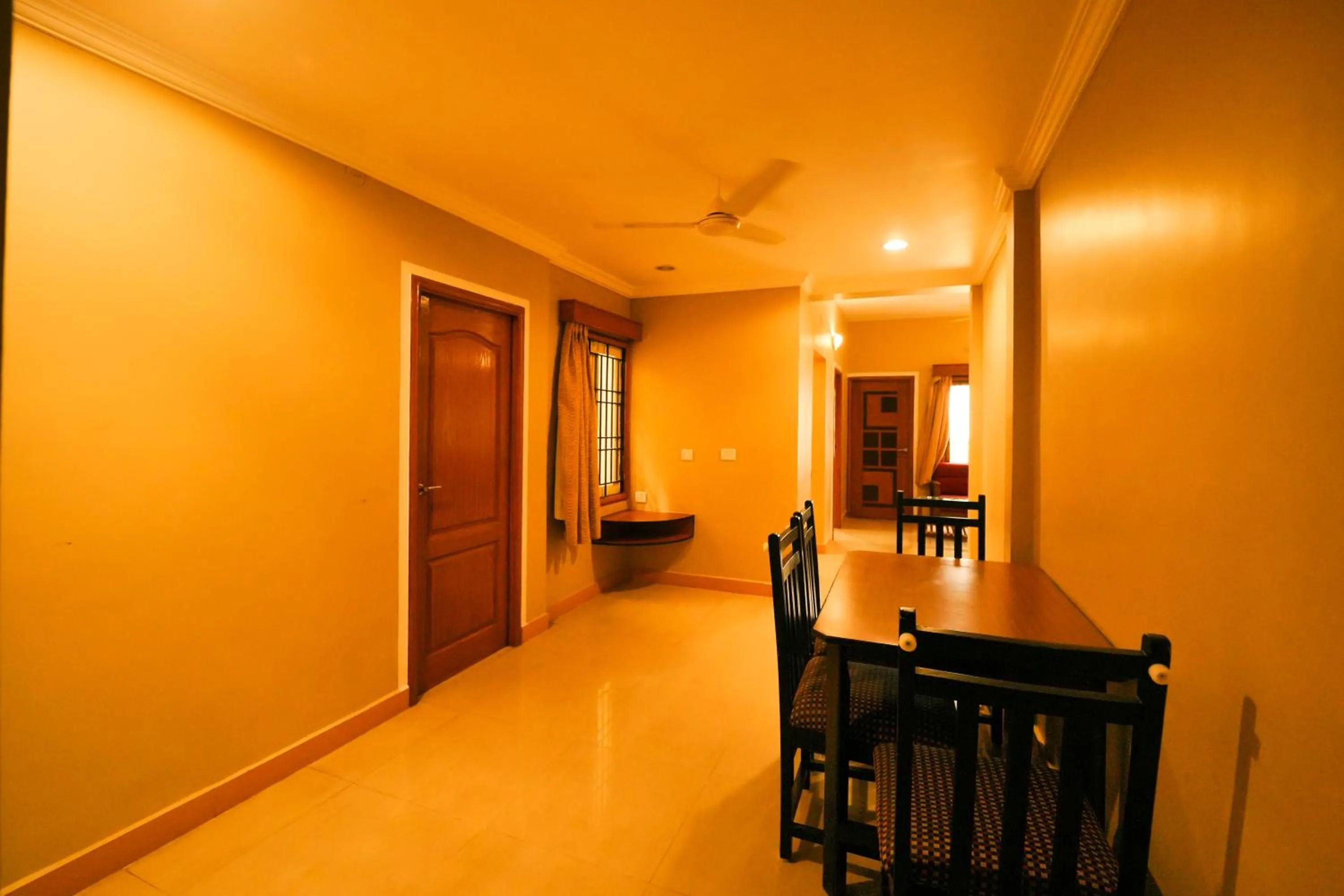 Dining area in HOTEL THIRD EYE by RAMANA TOWERS