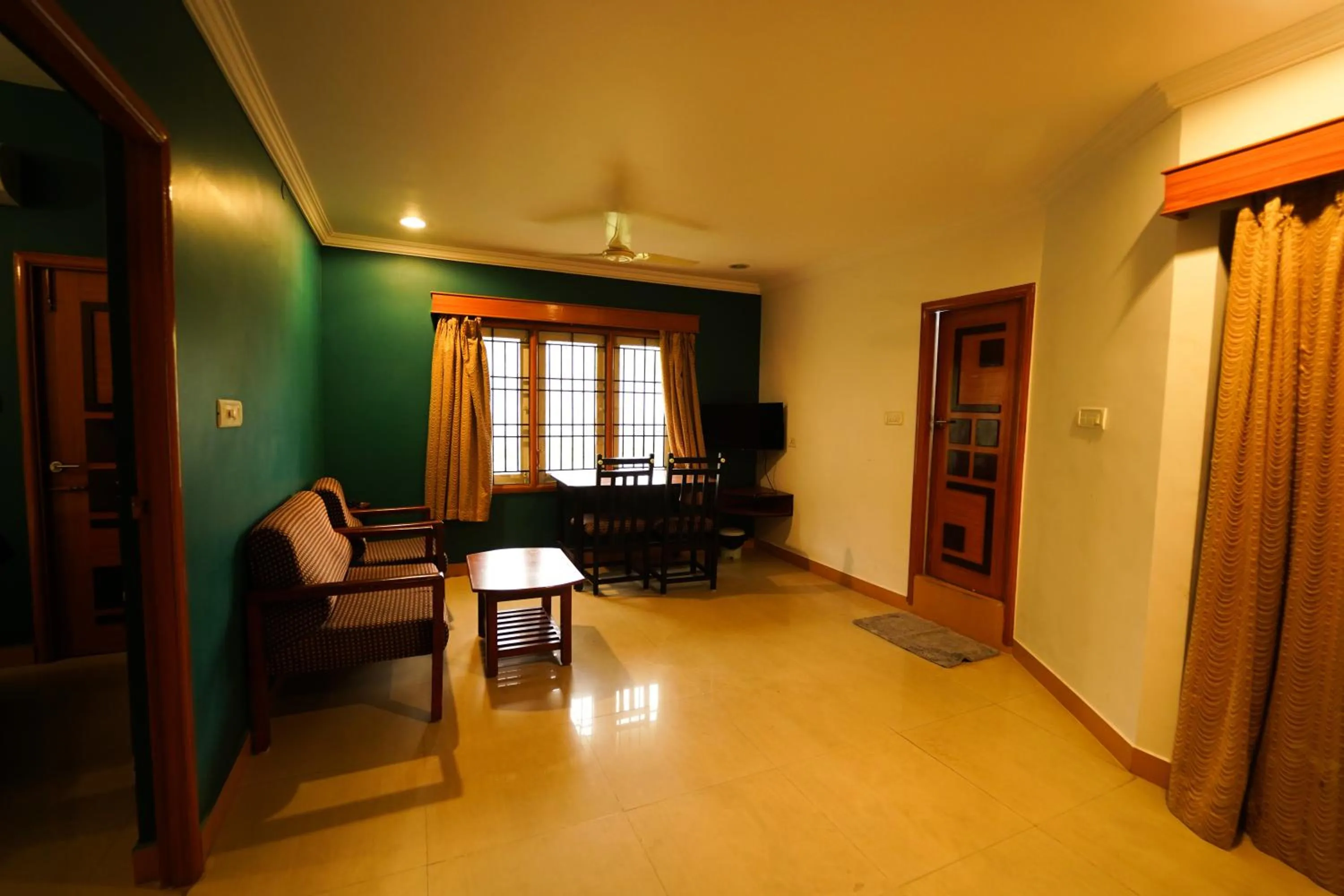 Living room in HOTEL THIRD EYE by RAMANA TOWERS