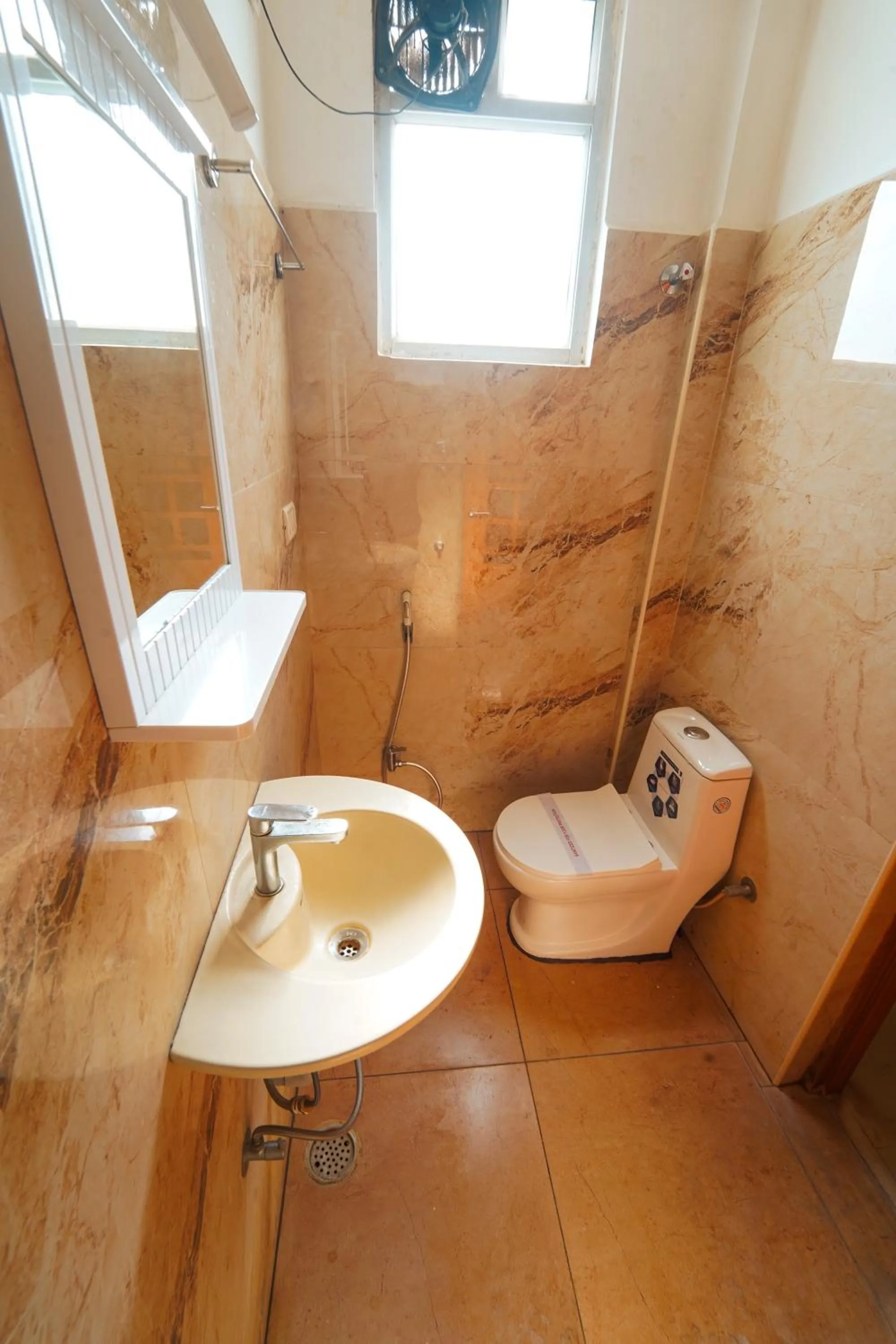 Toilet in HOTEL THIRD EYE by RAMANA TOWERS