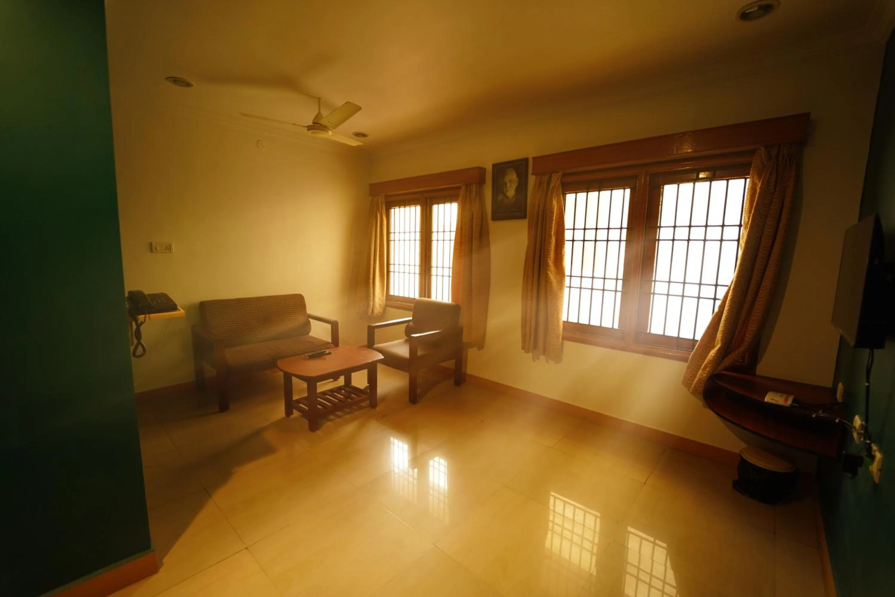 Living room in HOTEL THIRD EYE by RAMANA TOWERS