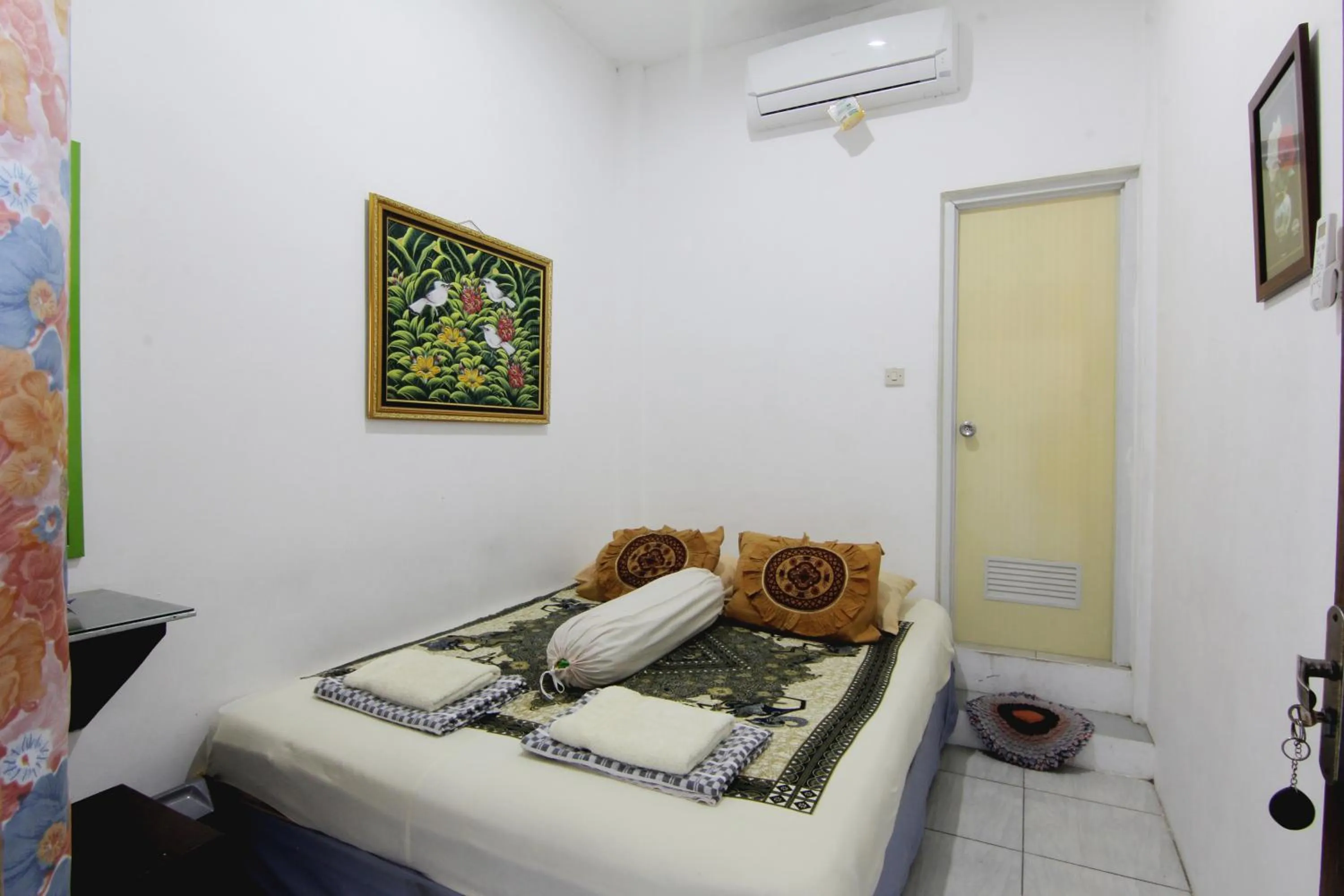 Photo of the whole room, Bed in Tiga Dua Homestay
