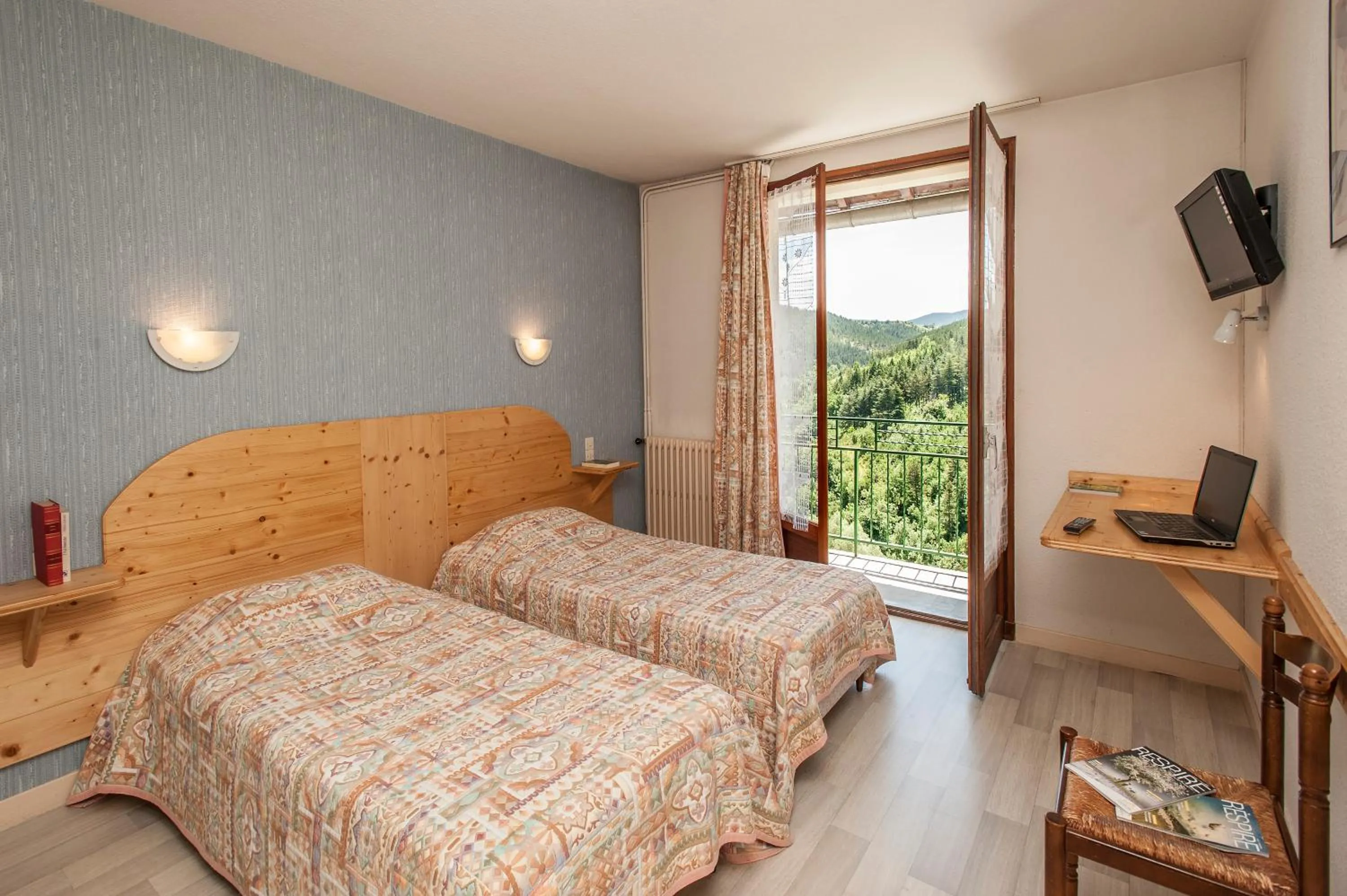 Bed in Hôtel Des Rochers