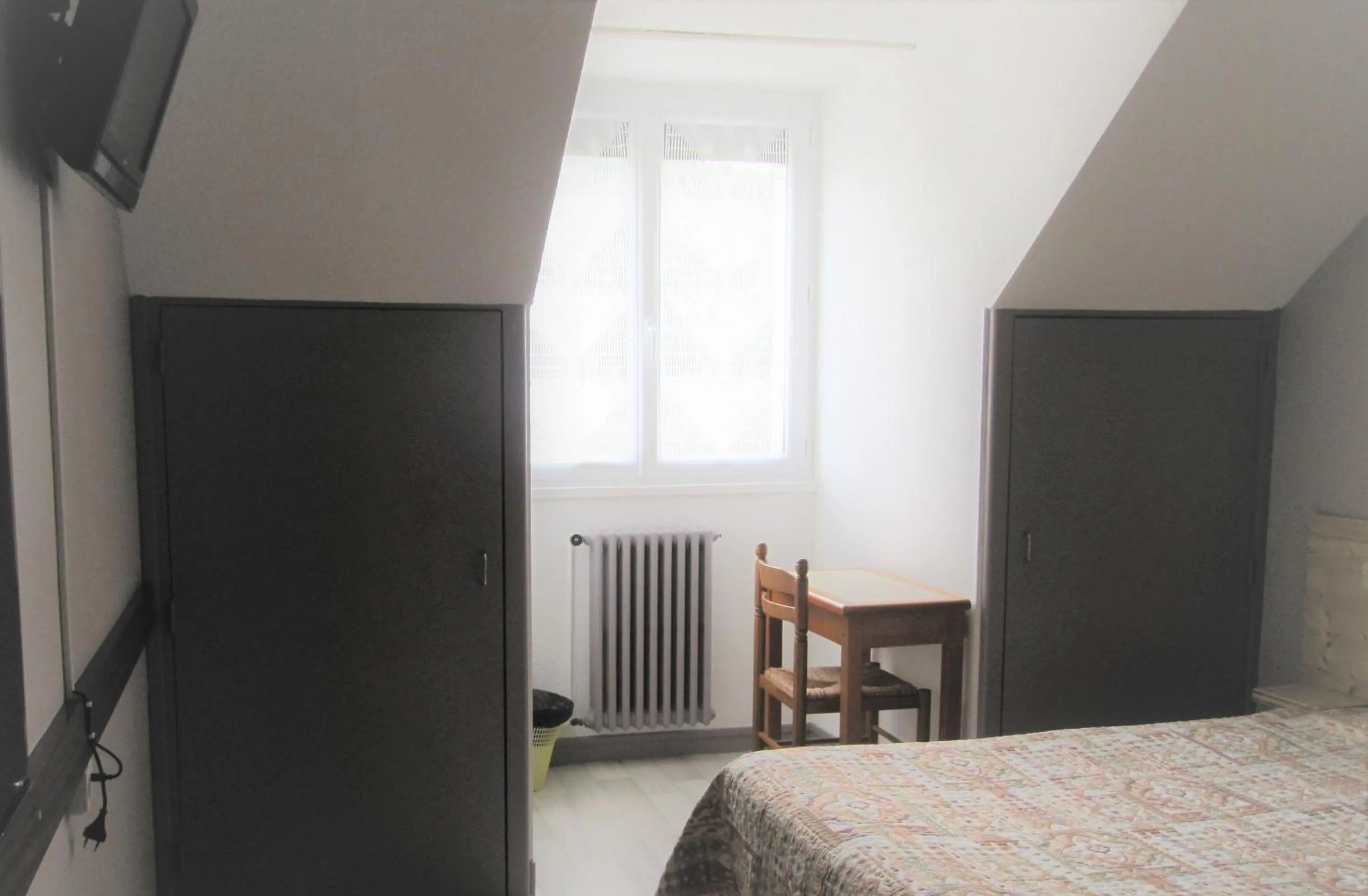 Bed in Hôtel Des Rochers