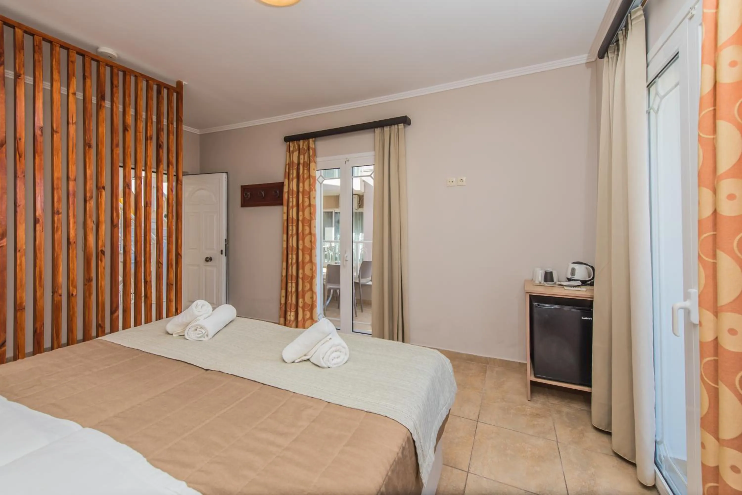 Bed in Porto Planos Beach Hotel