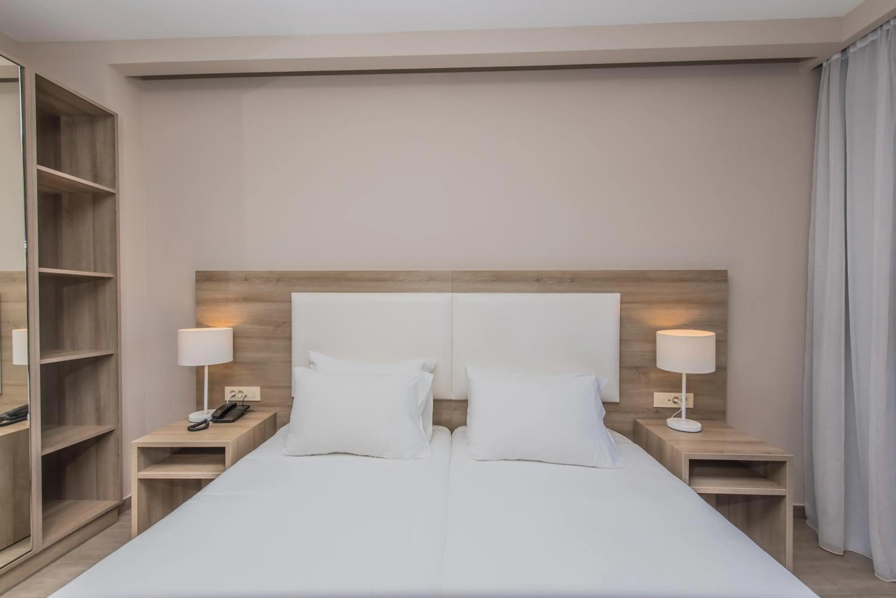 Bed in Porto Planos Beach Hotel