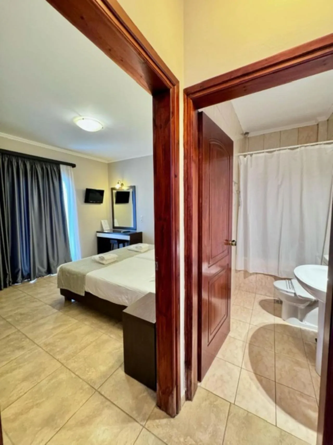 Photo of the whole room, Bed in Porto Planos Beach Hotel