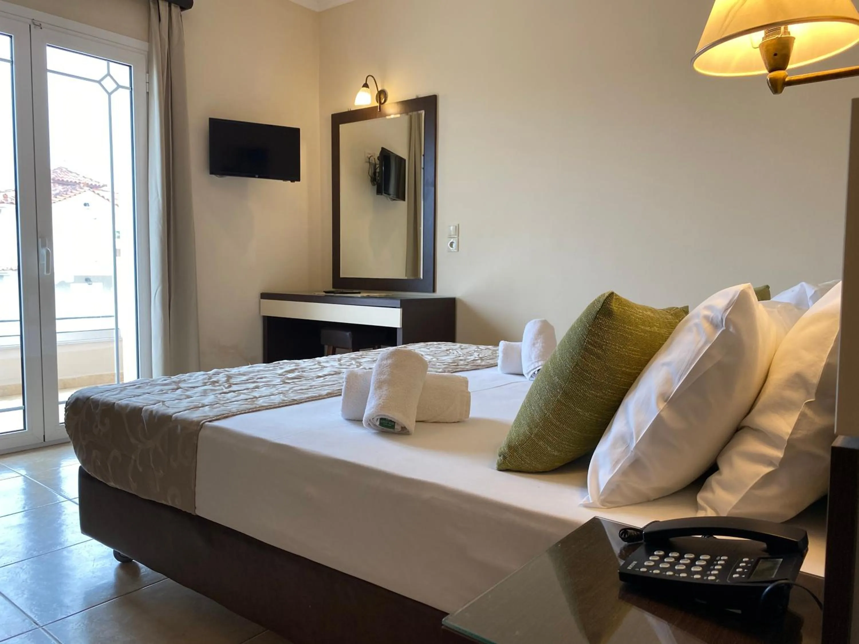 Bed in Porto Planos Beach Hotel