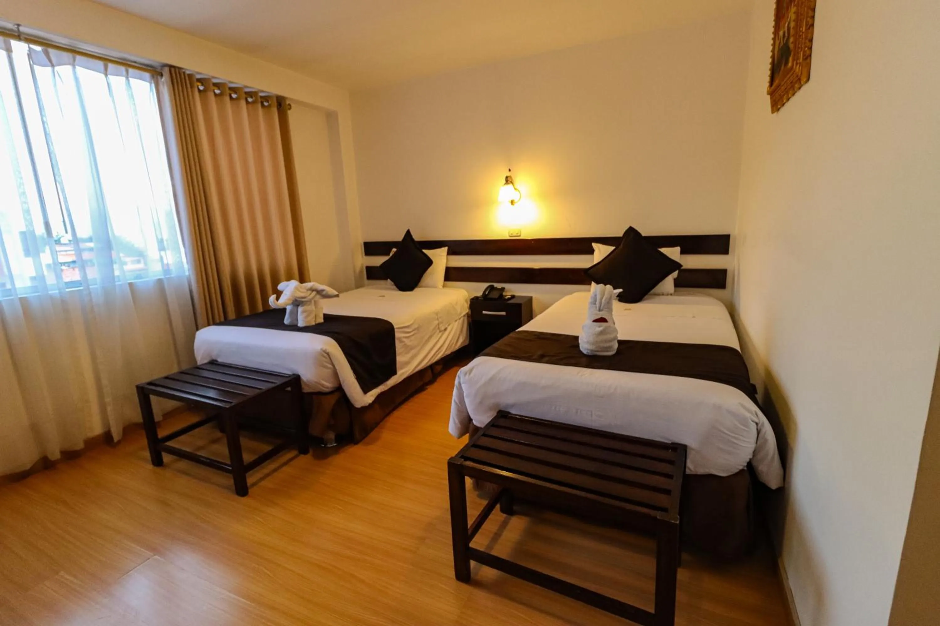 Bed in Hotel Kapac Inn-San Blas