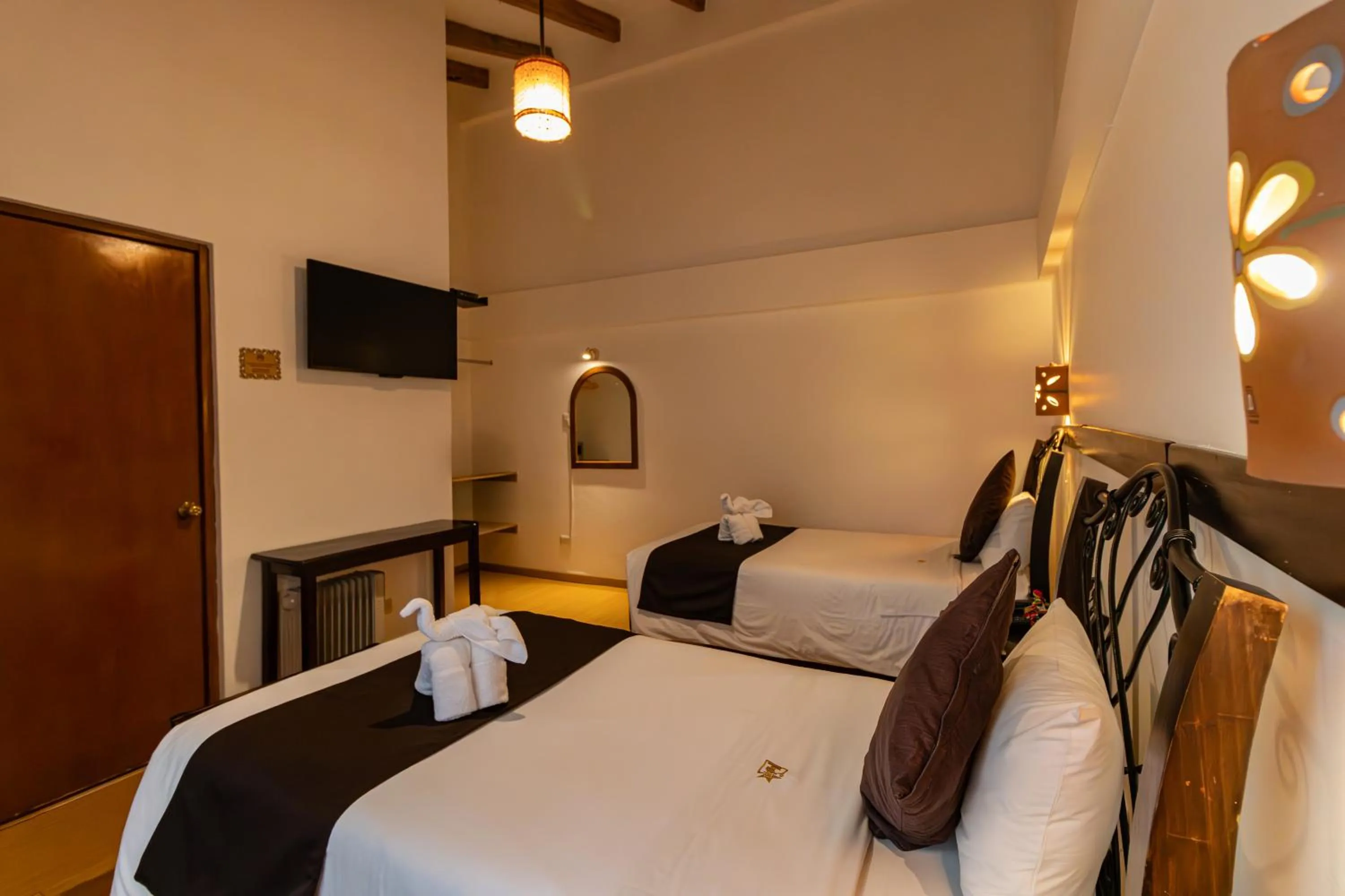 Bed in Hotel Kapac Inn-San Blas