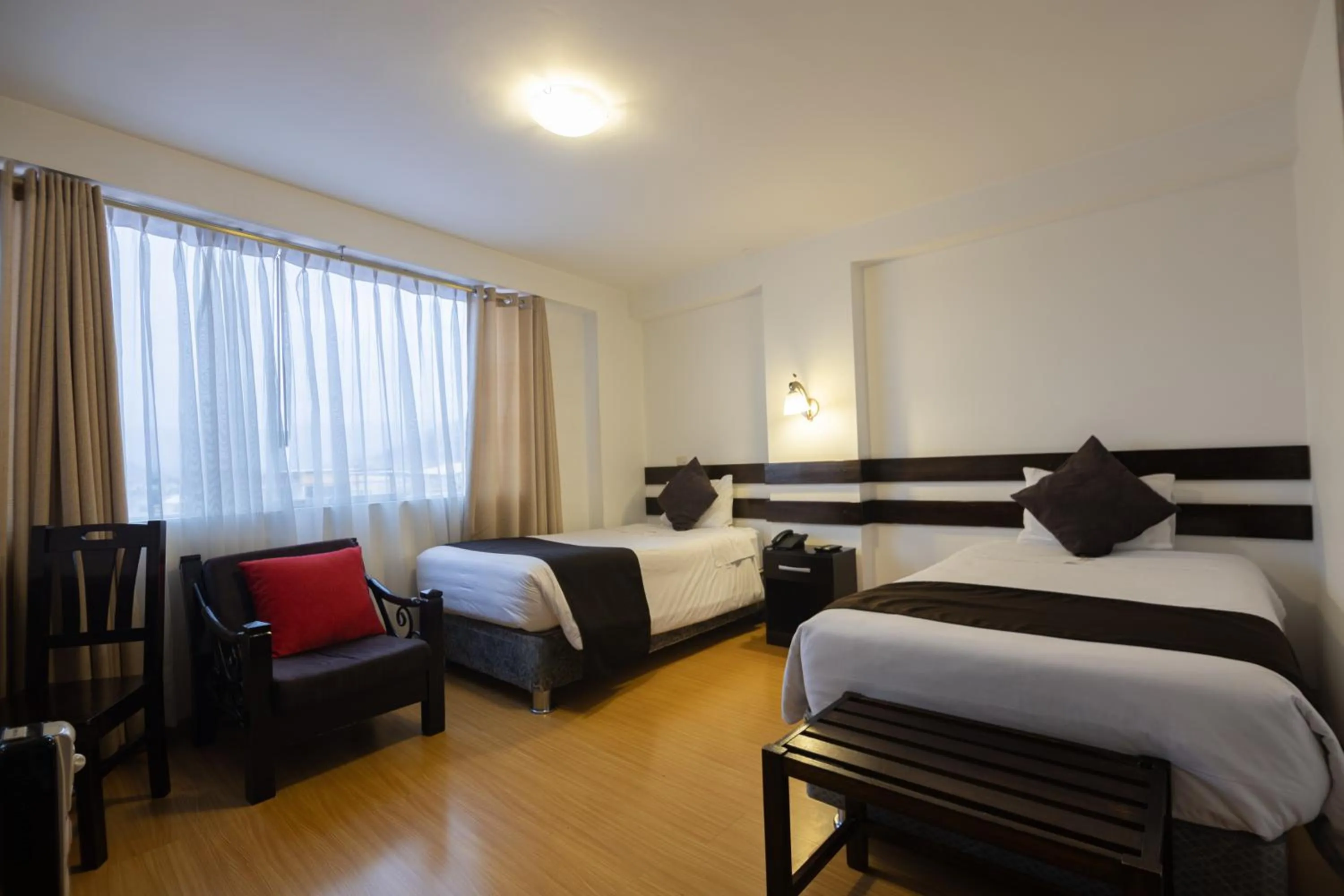 Bed in Hotel Kapac Inn-San Blas