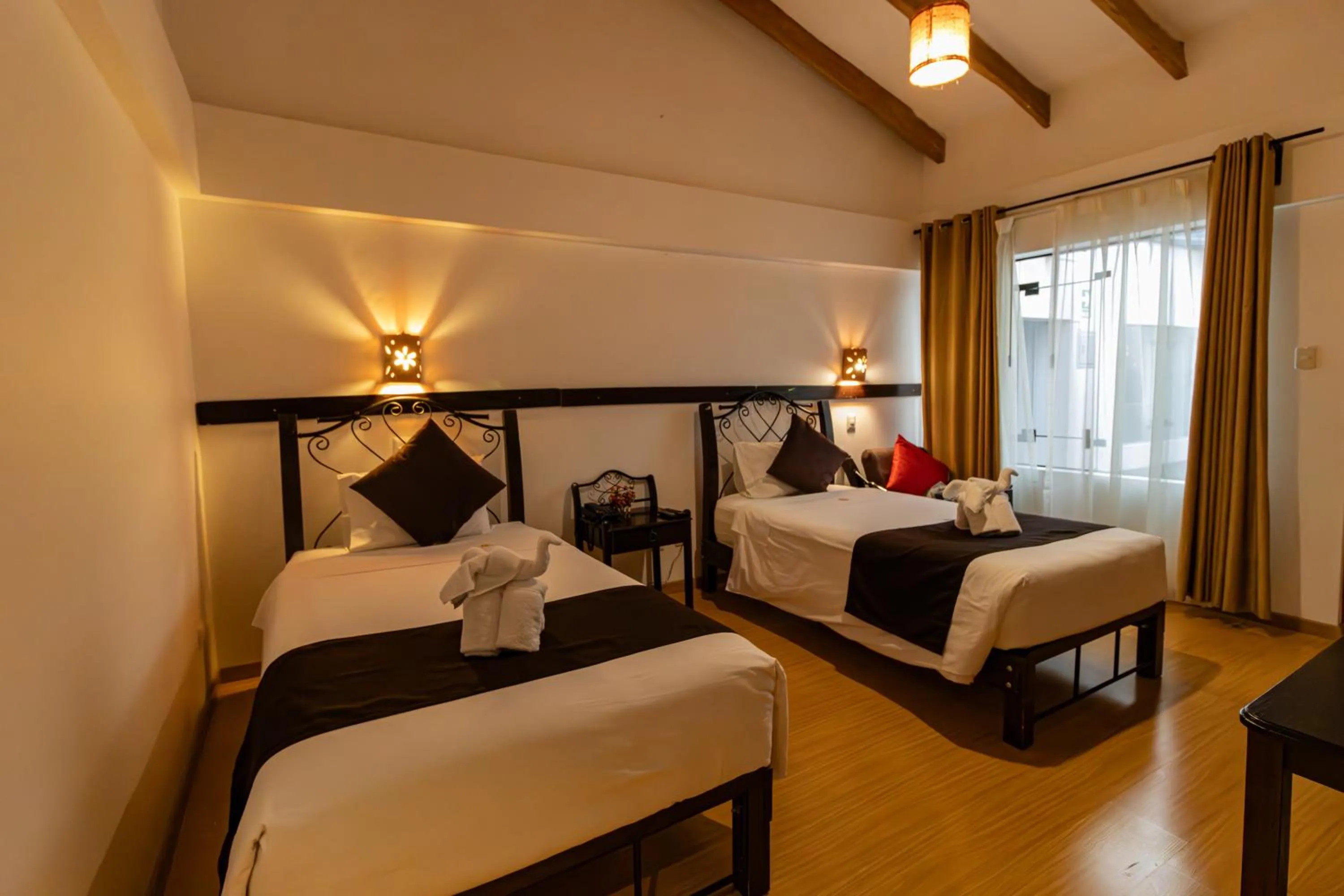 Bed in Hotel Kapac Inn-San Blas