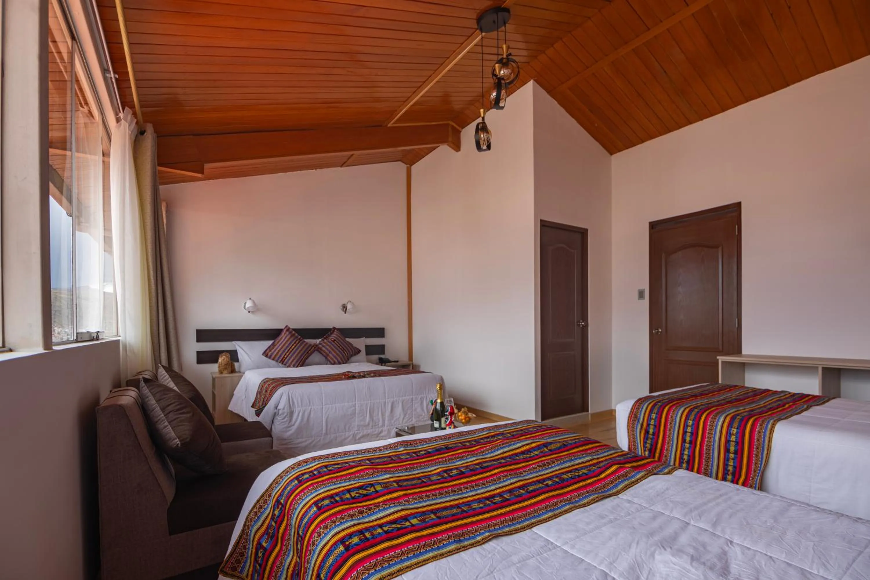 Bed in Hotel Kapac Inn-San Blas