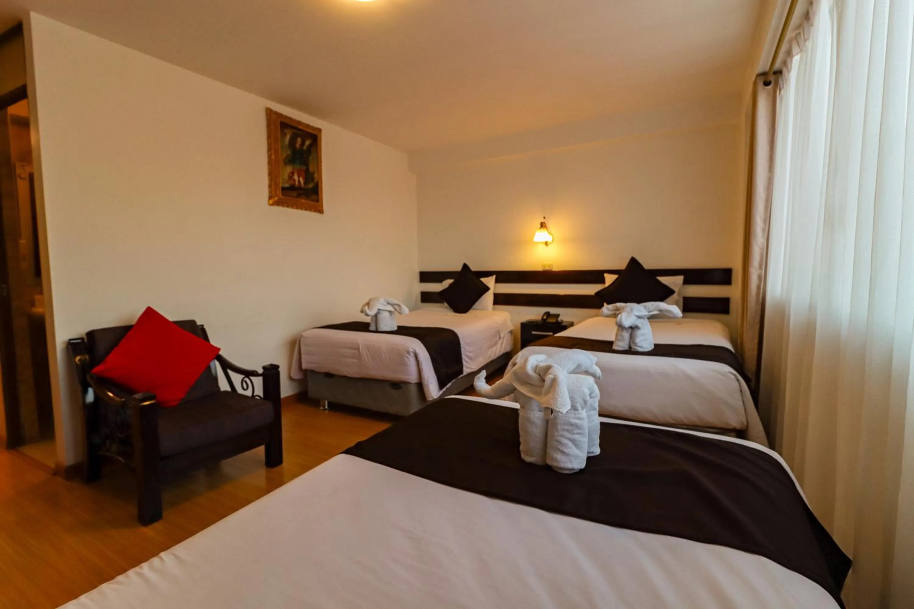 Bed in Hotel Kapac Inn-San Blas