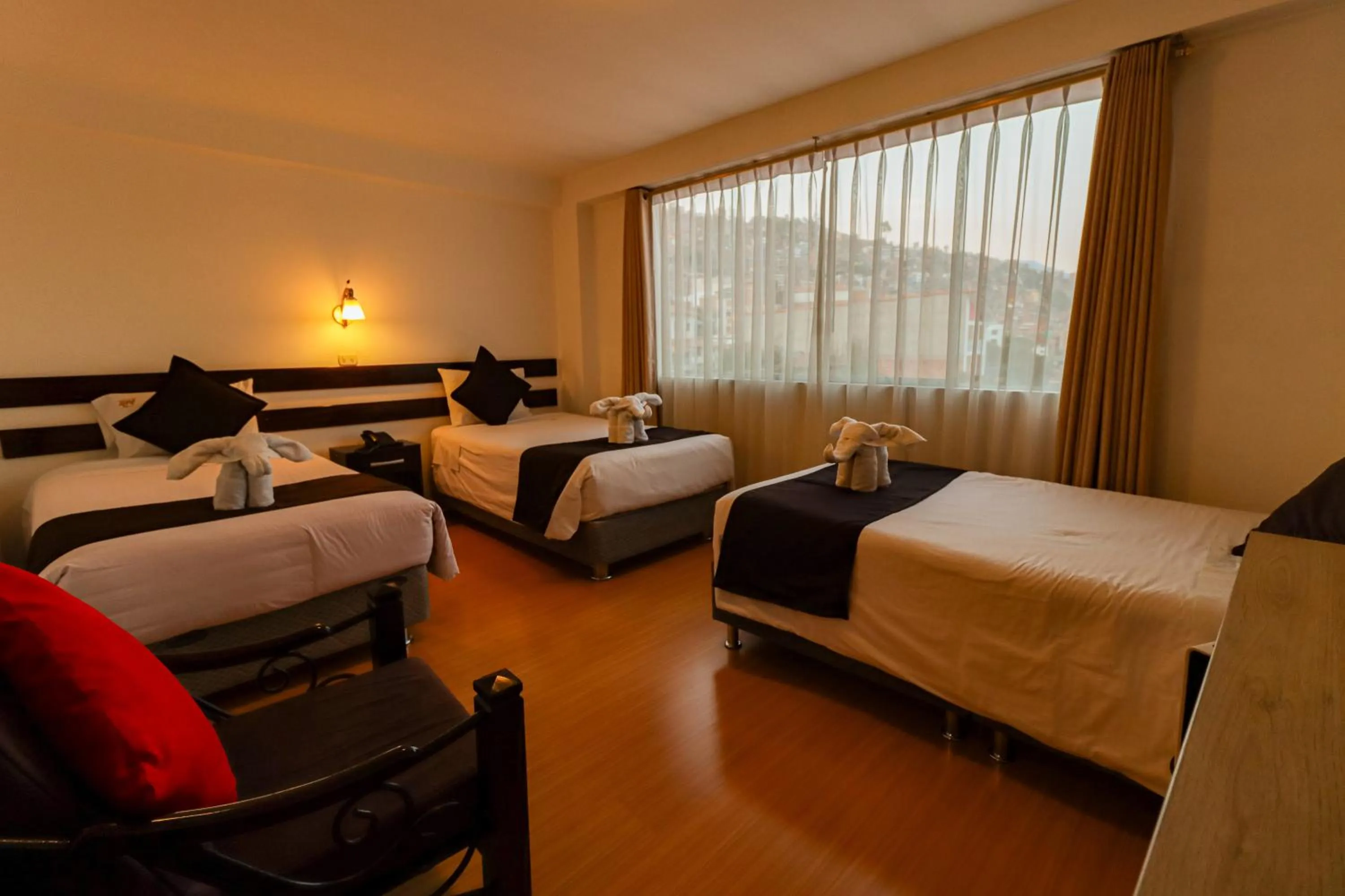 Bed in Hotel Kapac Inn-San Blas