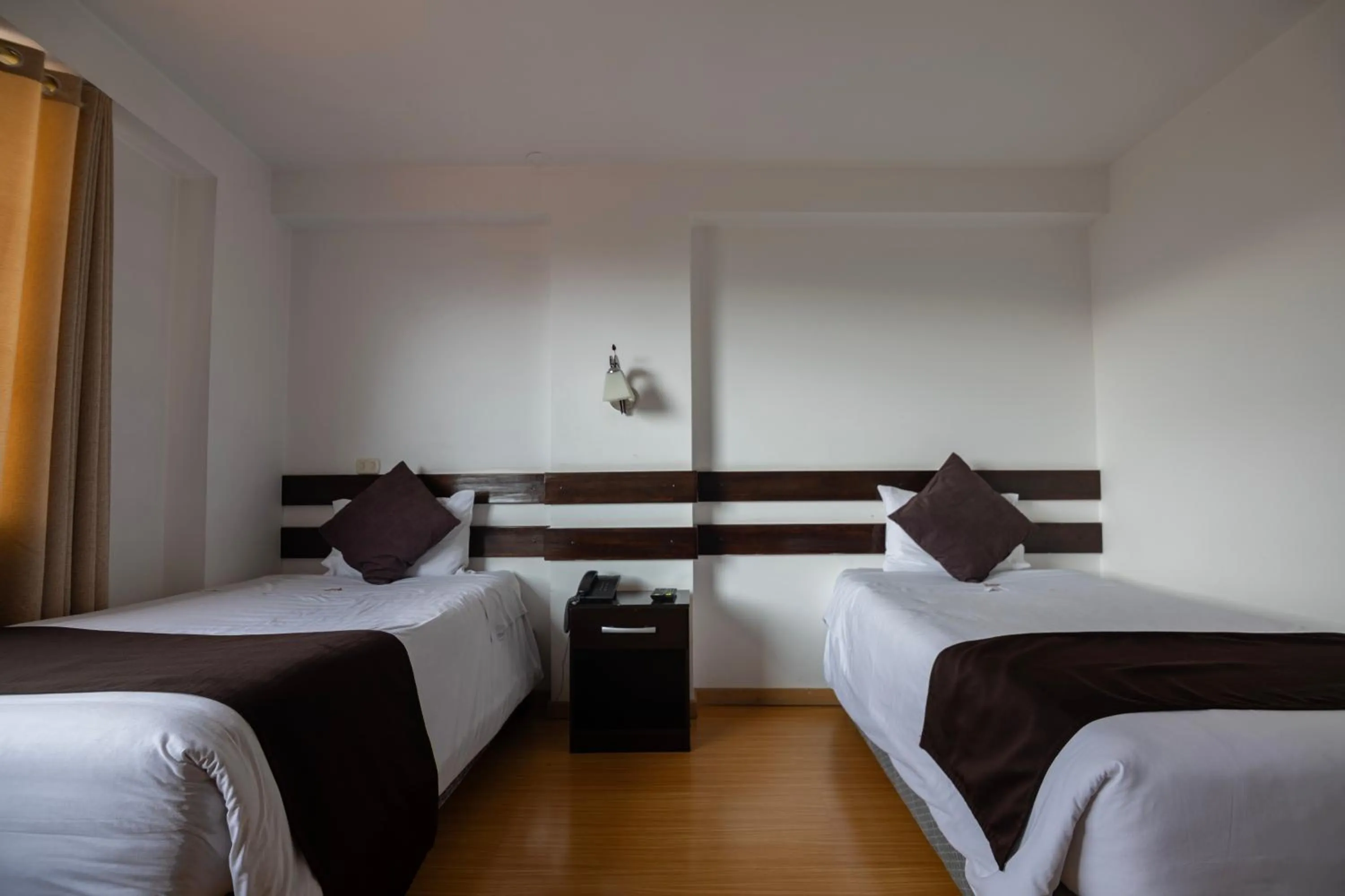 Bed in Hotel Kapac Inn-San Blas