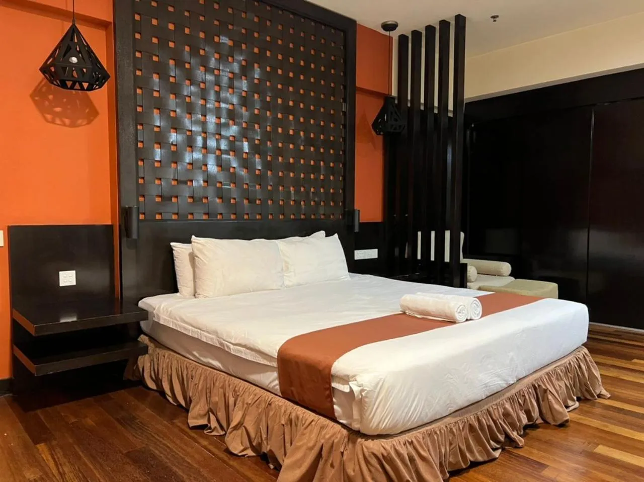 Bed in Raintree Resort Suites