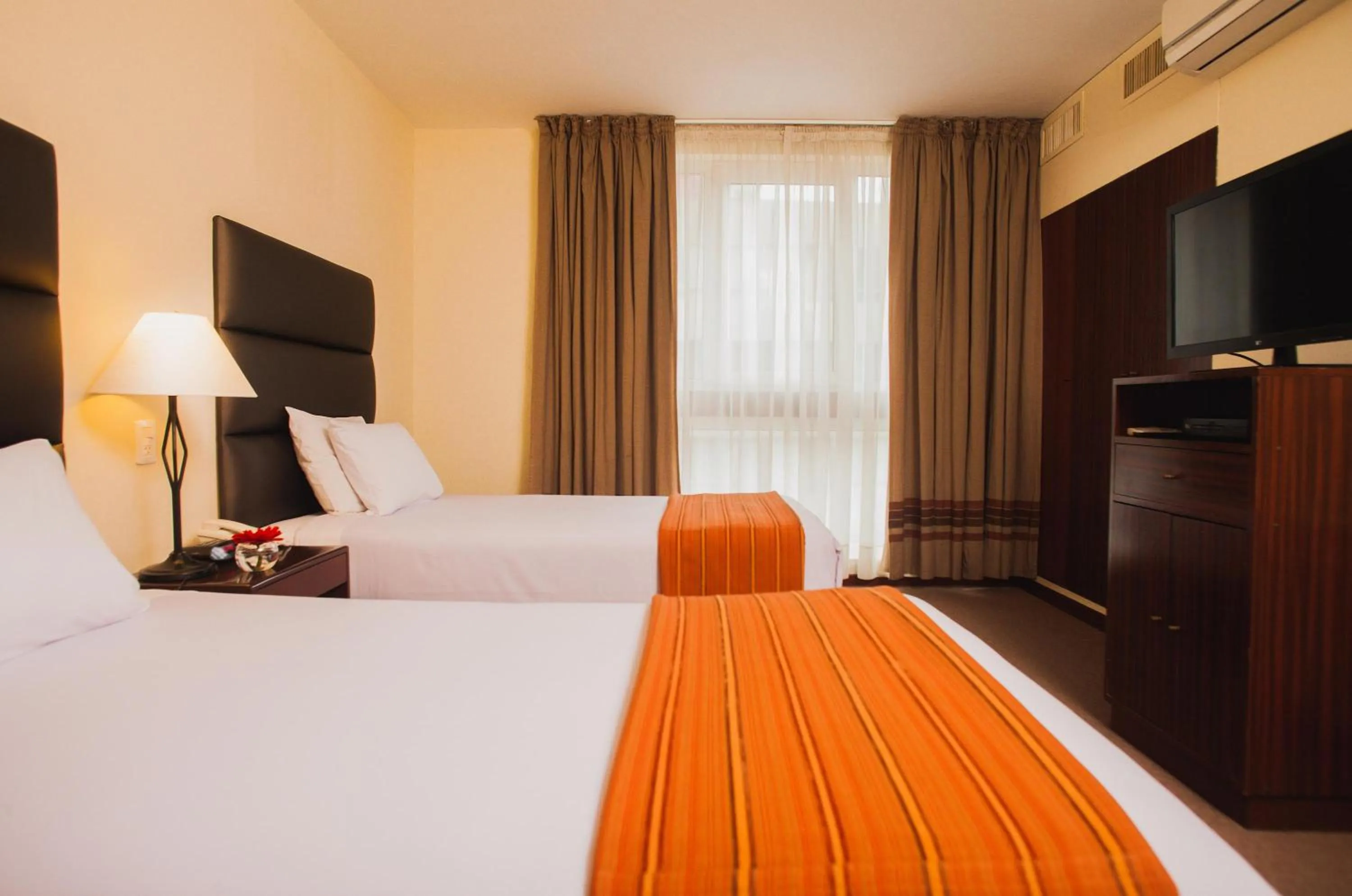 Bed in La Paz Apart Hotel