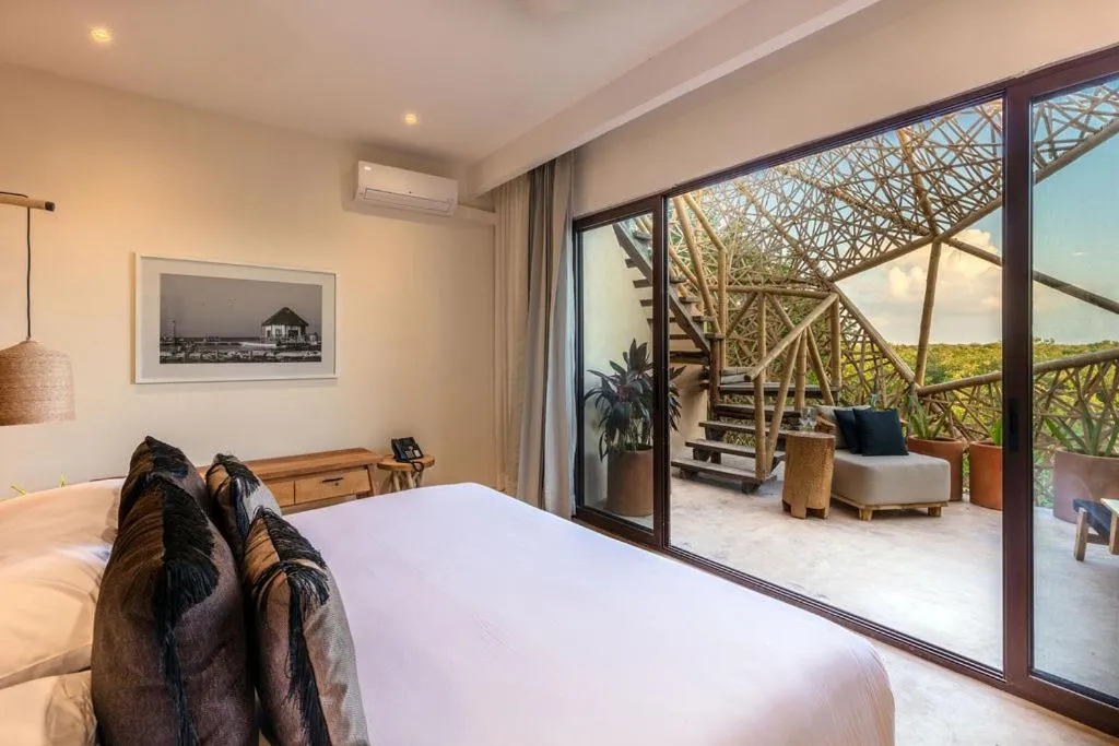 Bed in Hotel Villas Flamingos