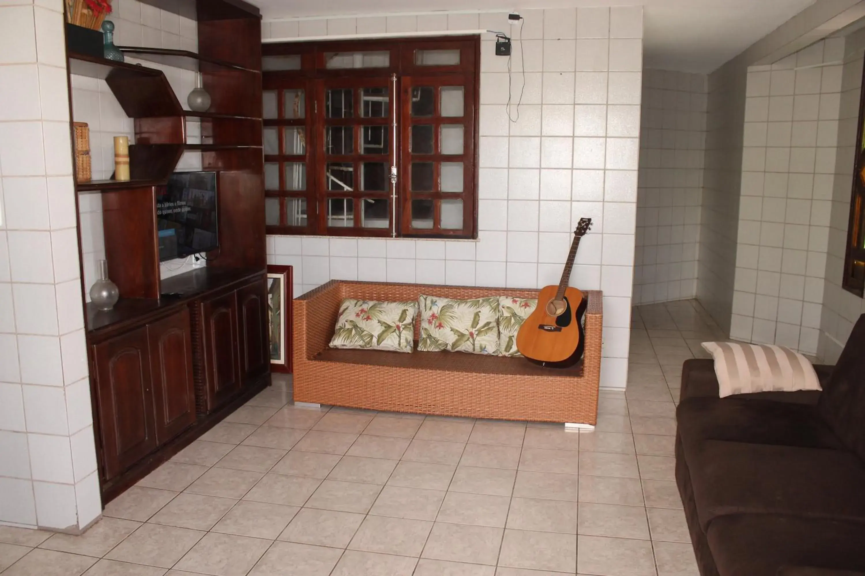 Communal lounge/ TV room, Bed in Hotel Pousada Farol da Praia Communal lounge/ TV room, Bed in Hotel Pousada Farol da Praia