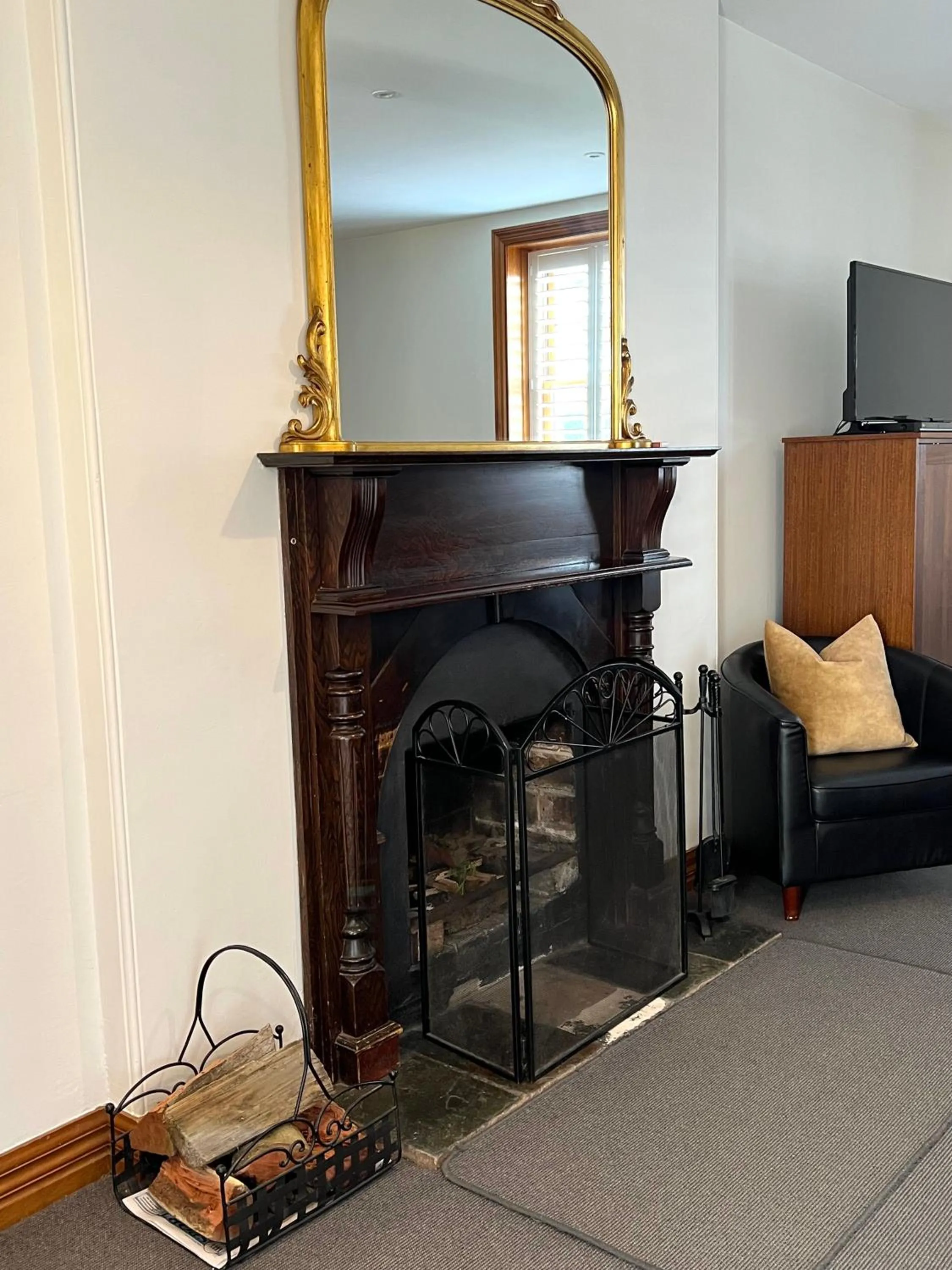 fireplace in Seacombe House Motor Inn Port Fairy