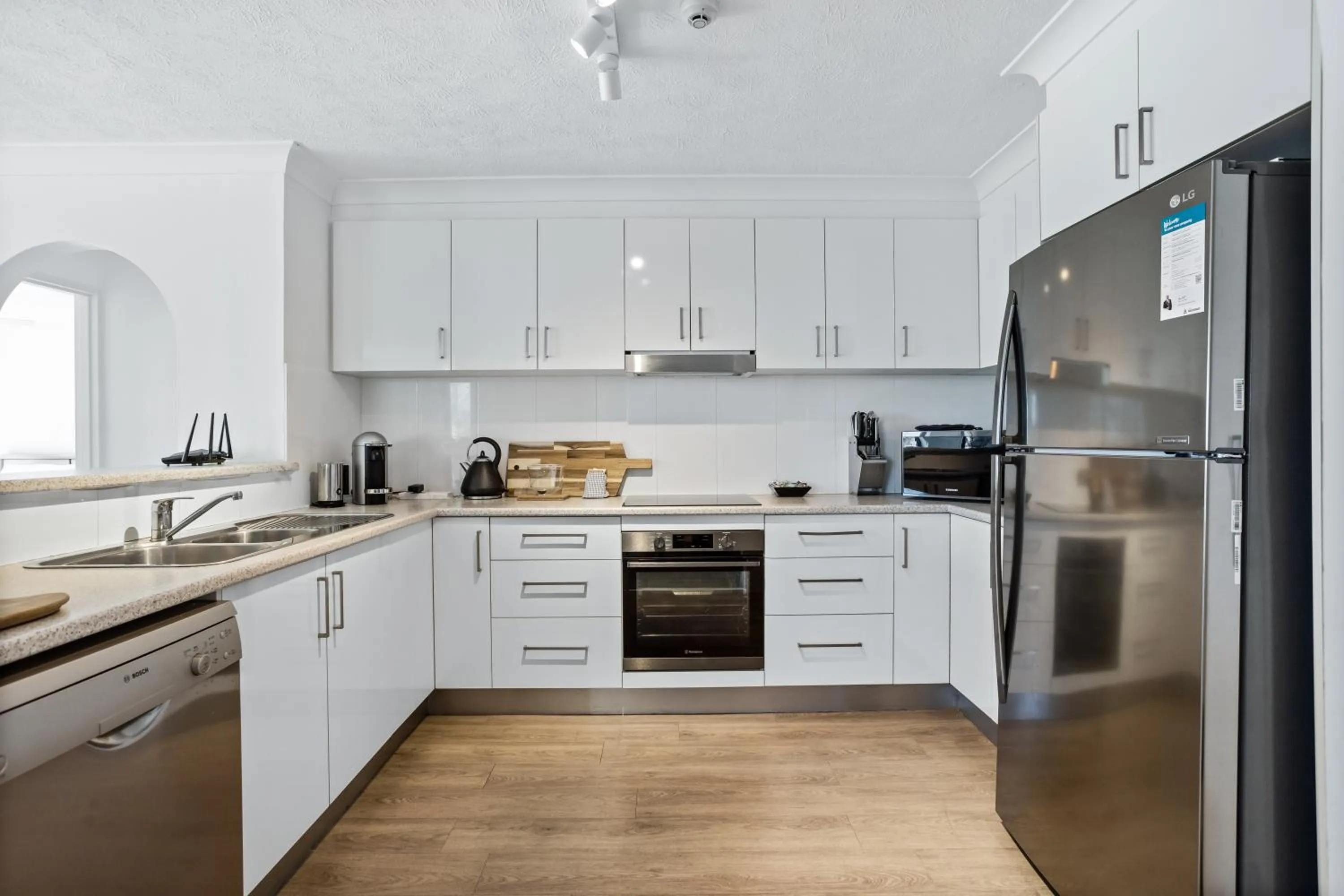 Kitchen or kitchenette in Genesis Apartments by Gold Coast Premium