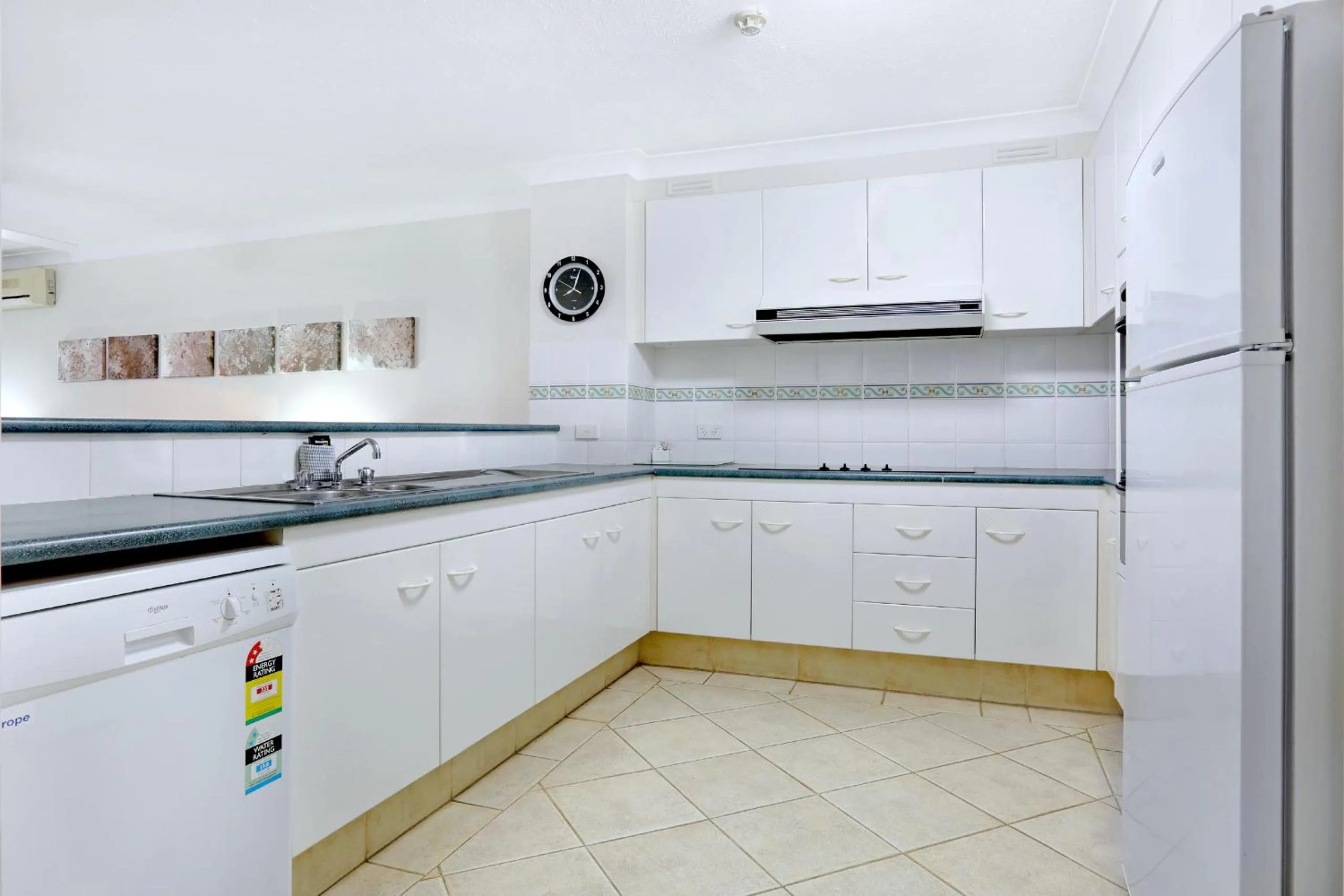 Kitchen or kitchenette in Genesis Apartments by Gold Coast Premium