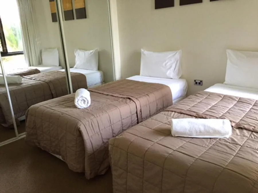 Bed in Genesis Apartments by Gold Coast Premium