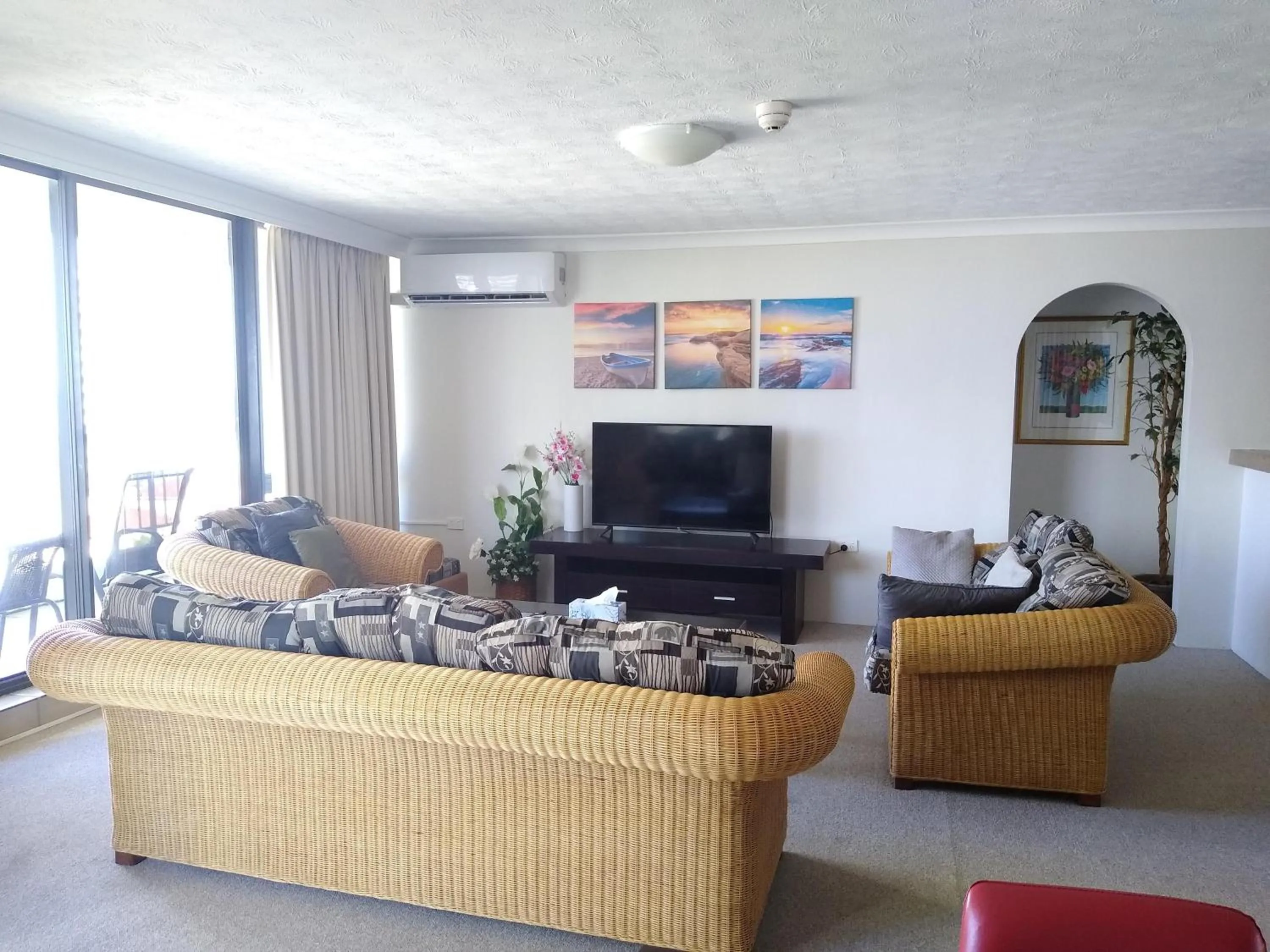 Communal lounge/ TV room in Genesis Apartments by Gold Coast Premium
