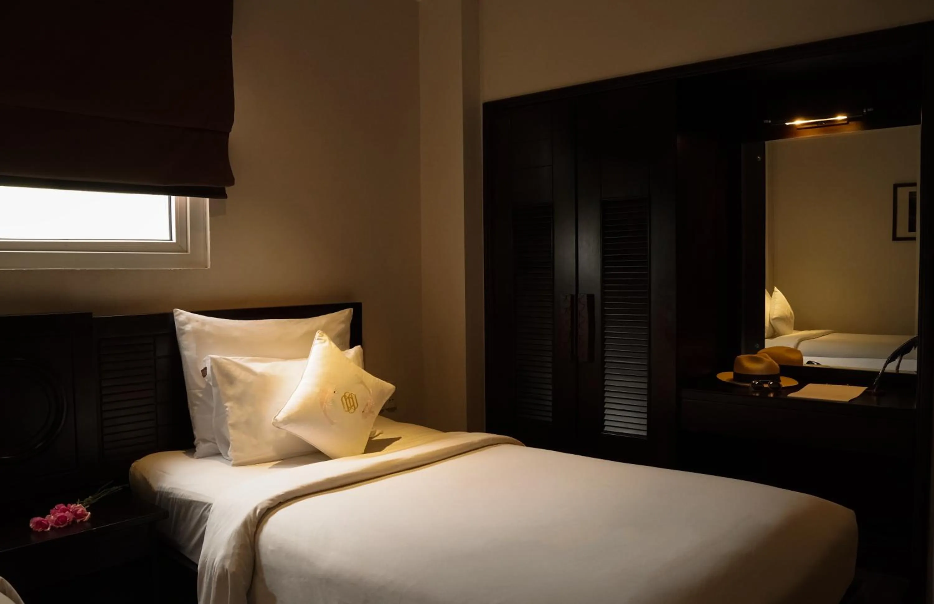 Bed in Cochin Zen Hotel