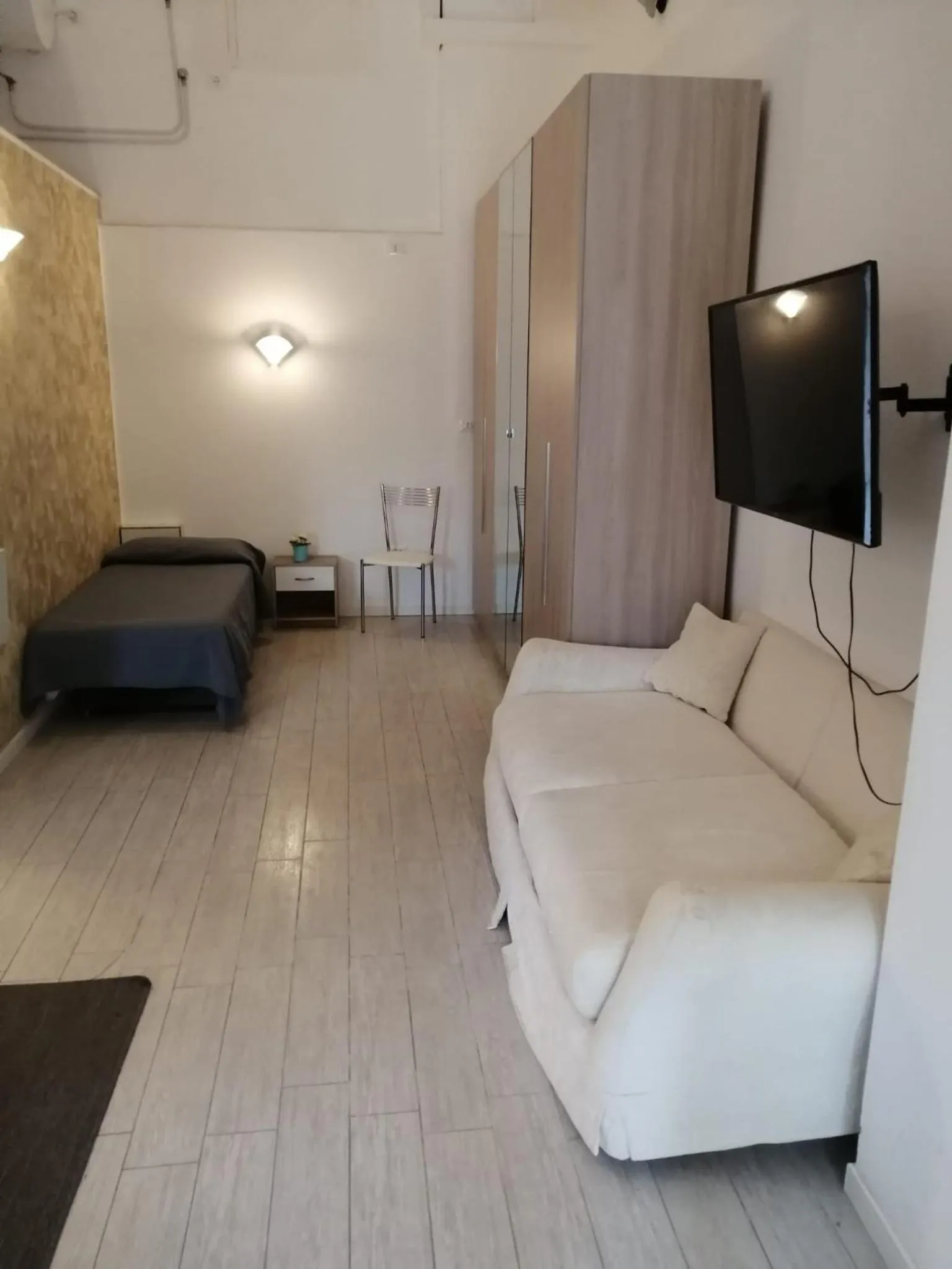 Living room, Bed in Ute Hotel