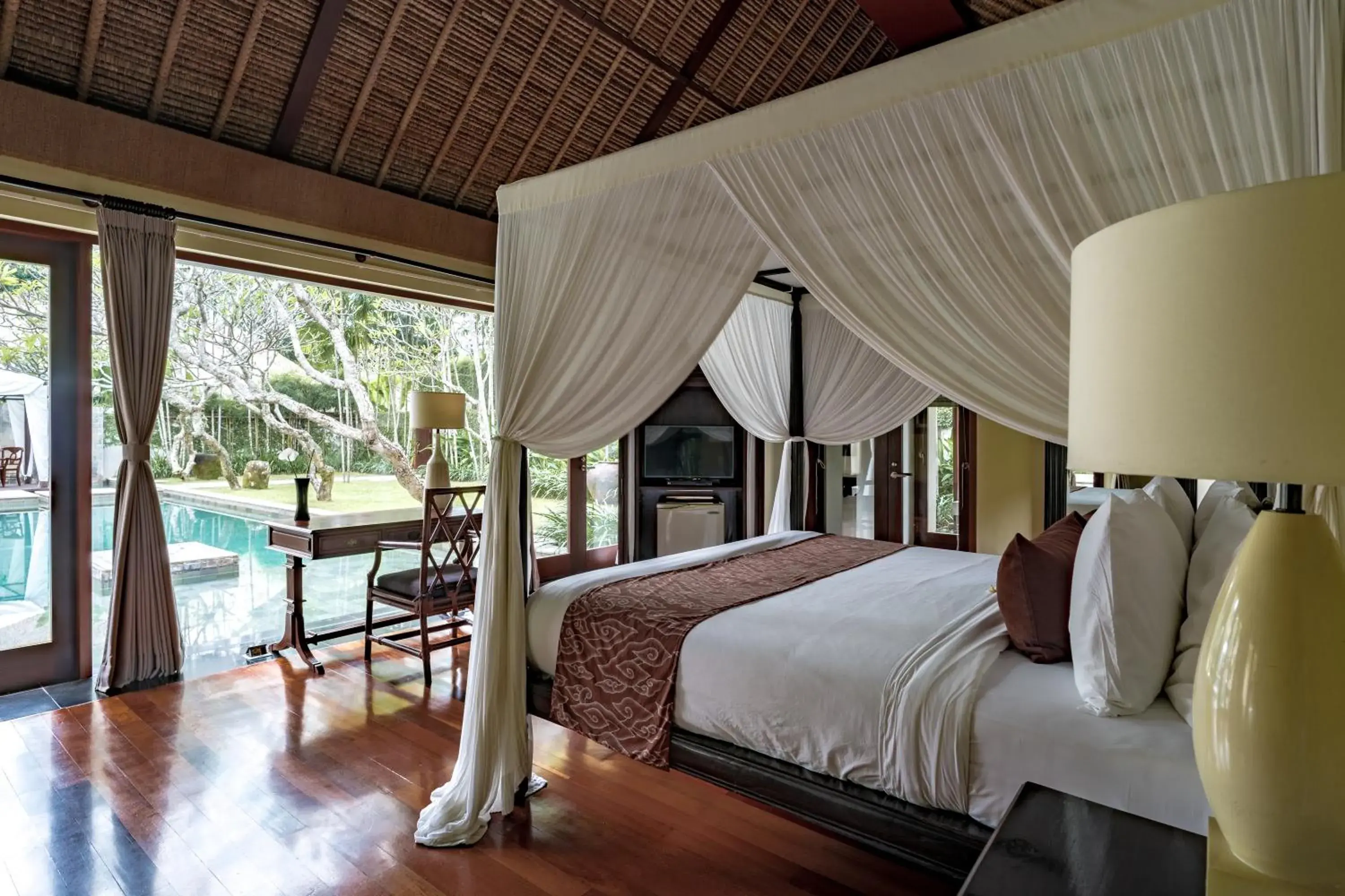 Bed in Kayumanis Nusa Dua Private Villa & Spa Bed in Kayumanis Nusa Dua Private Villa & Spa